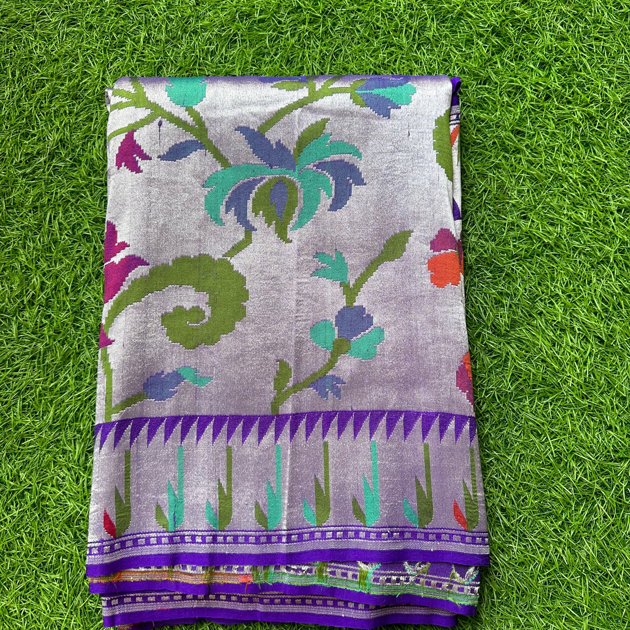 Purple pure tusser Georgette. Tissue based Paithani muniya border.