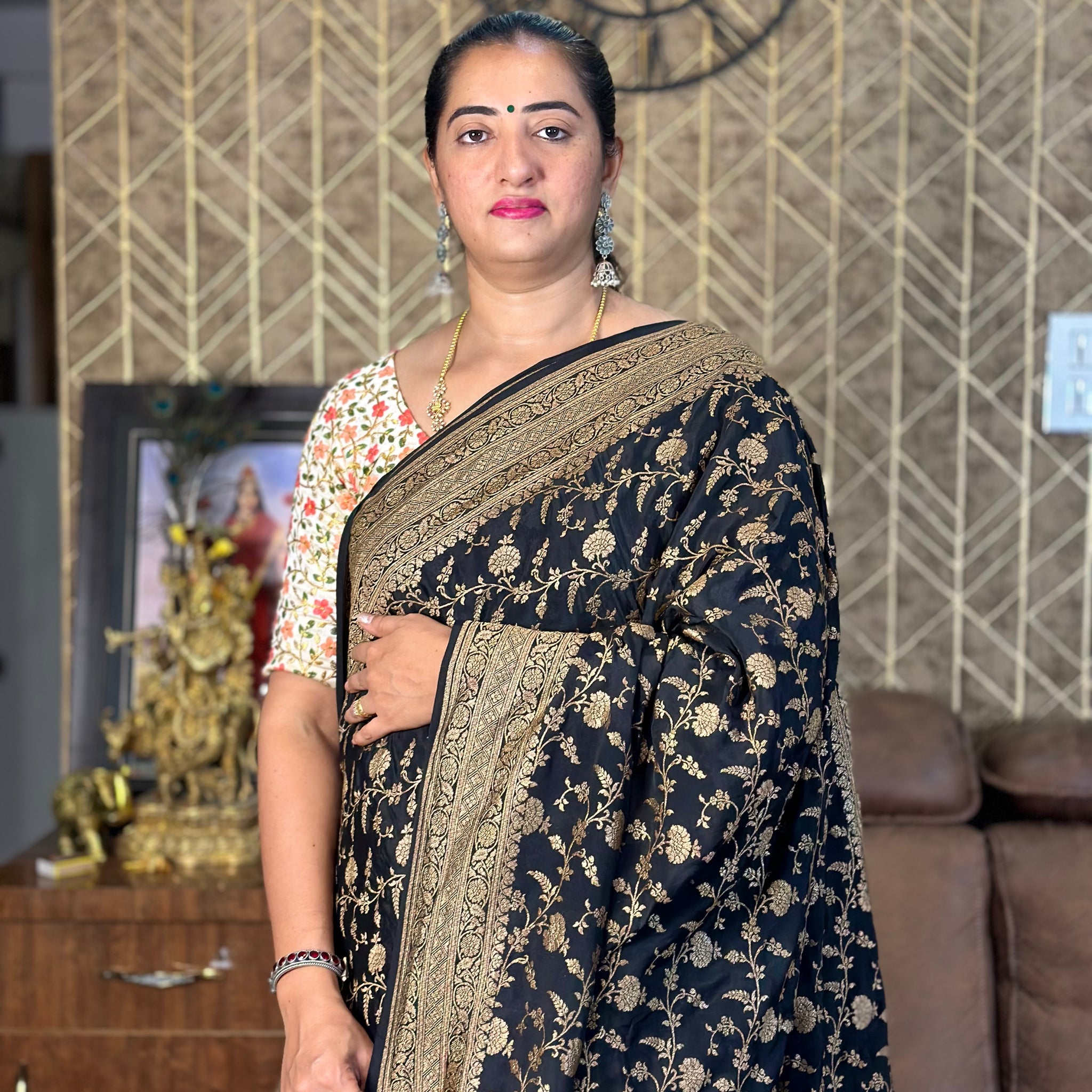 Black jaal pure crepe Banaras silk sarees.  With butta blouse