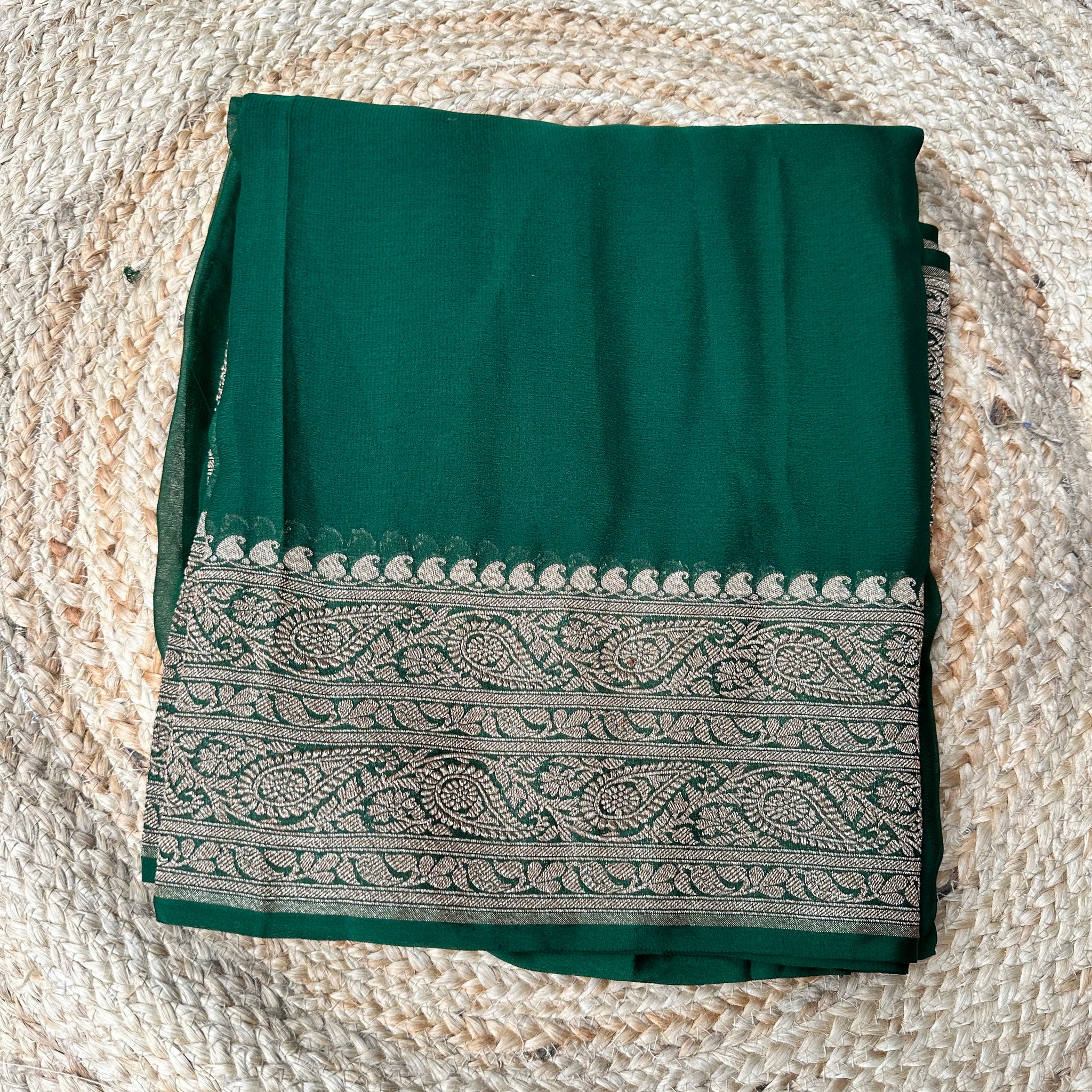 Deep green pure khaddi Georgette plain sarees with blouse