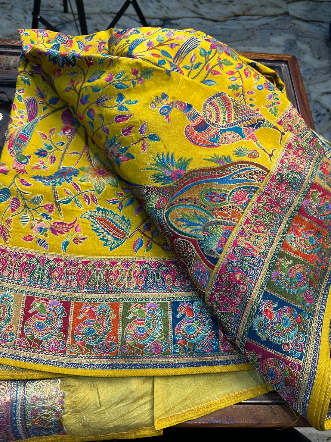 Mustard pure moonga crepe Kashmiri work all over the body.
