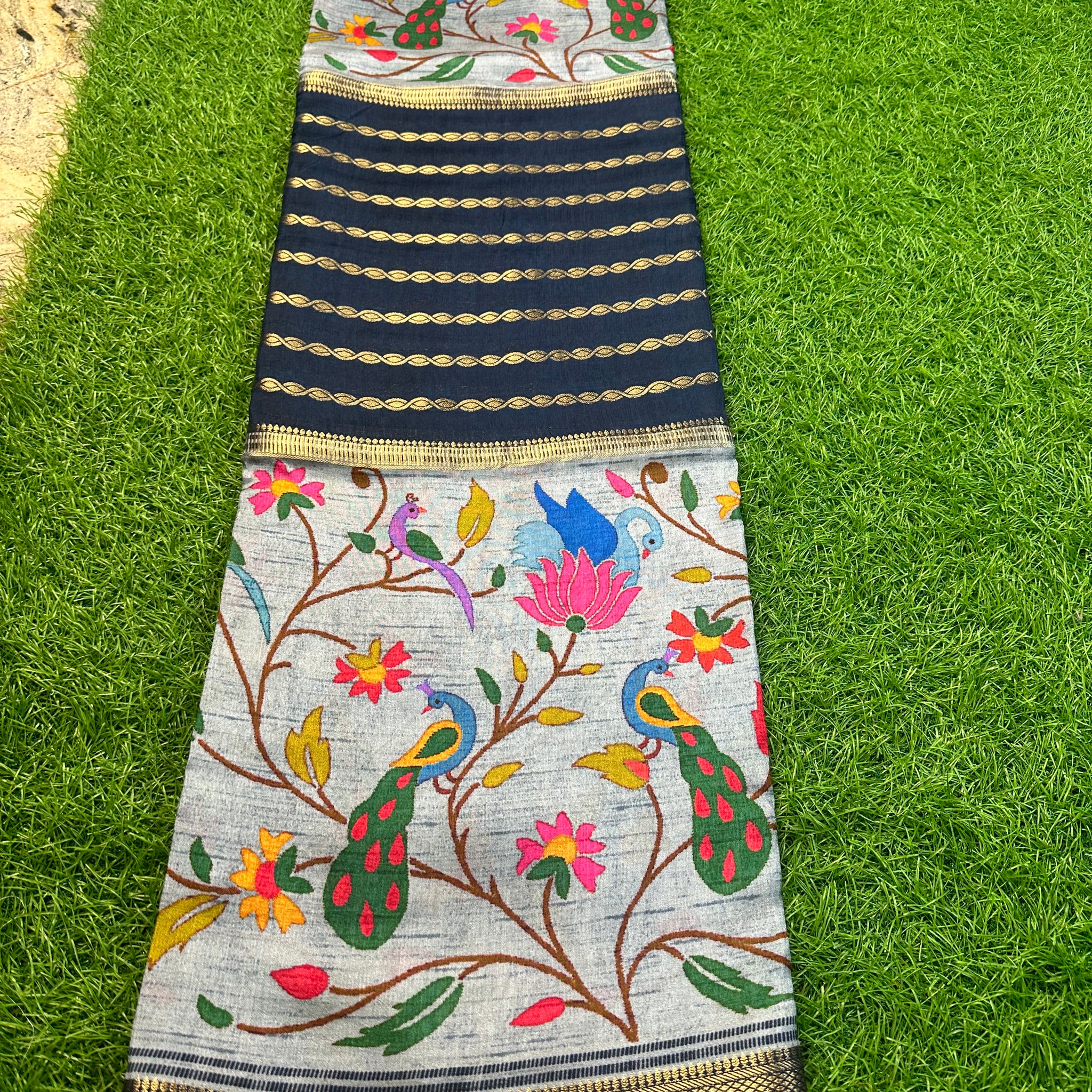 Grey and navy blue semi crepe kalamkari saree.
