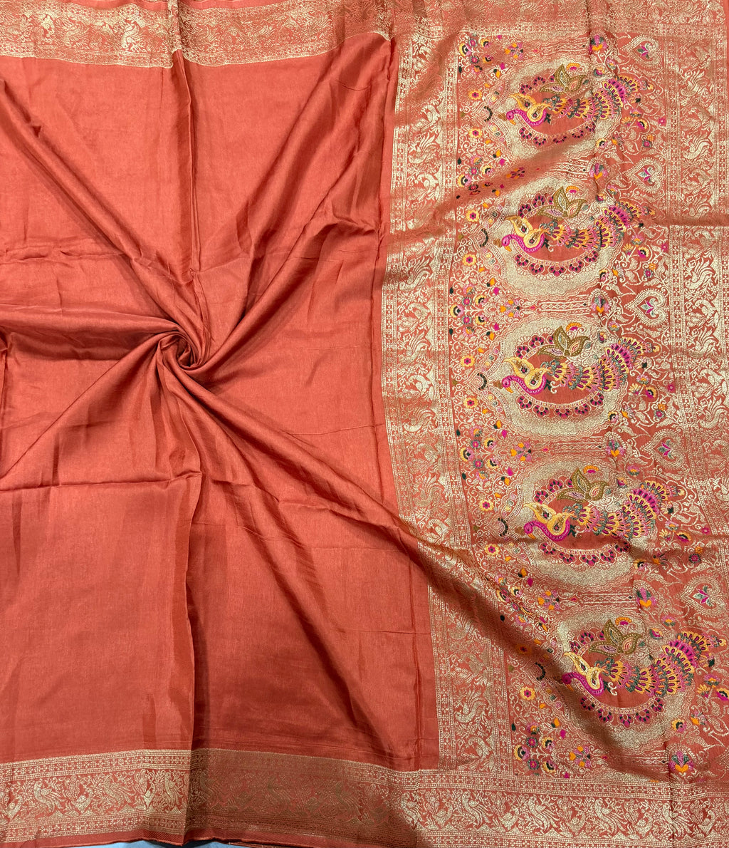 Rust orange Kanchi border plain modal silk saree