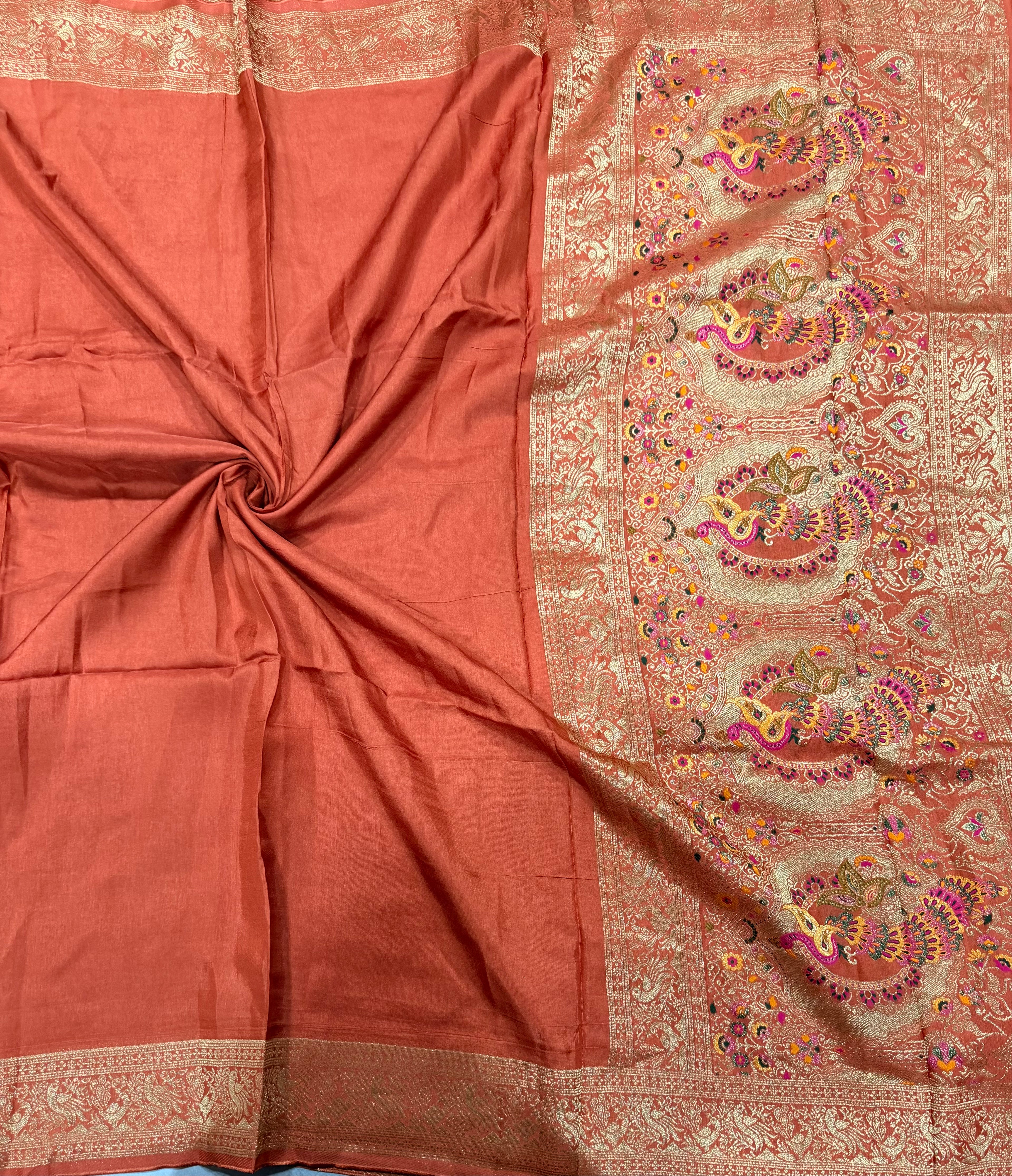 Rust orange Kanchi border plain modal silk saree