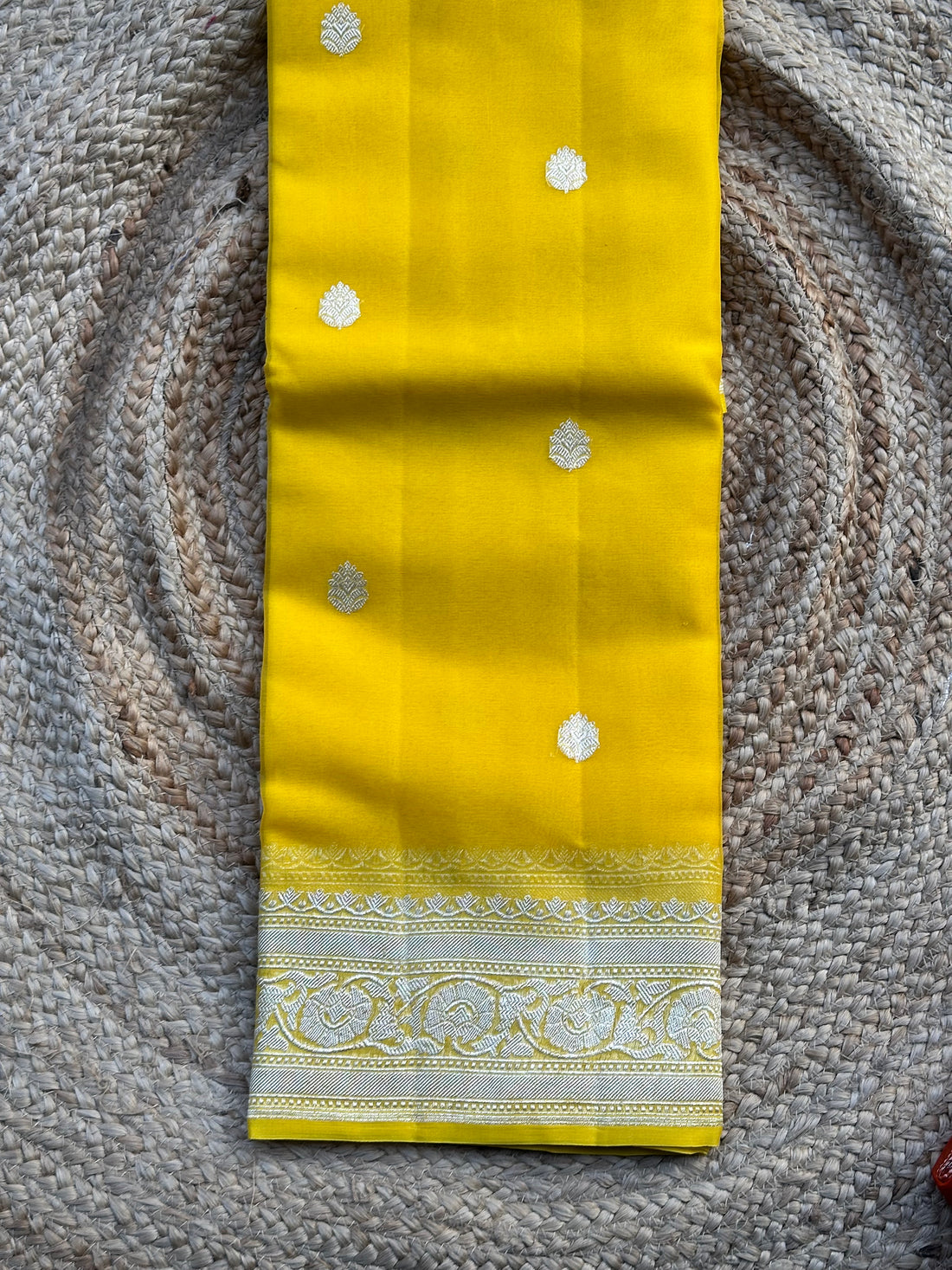 Lemon yellow pure khaddi chiffon silver zari hand woven sarees with