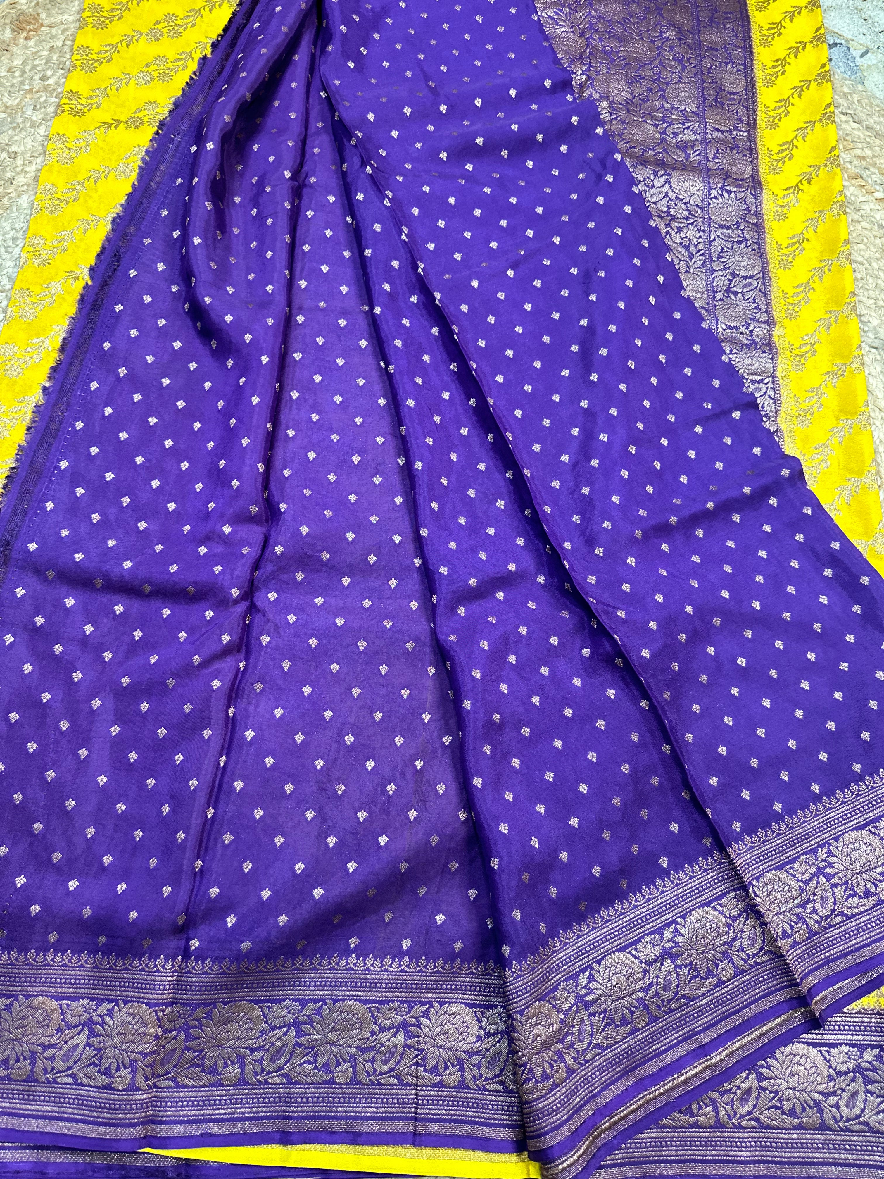 Yellow and purple crepe chiffon sarees.