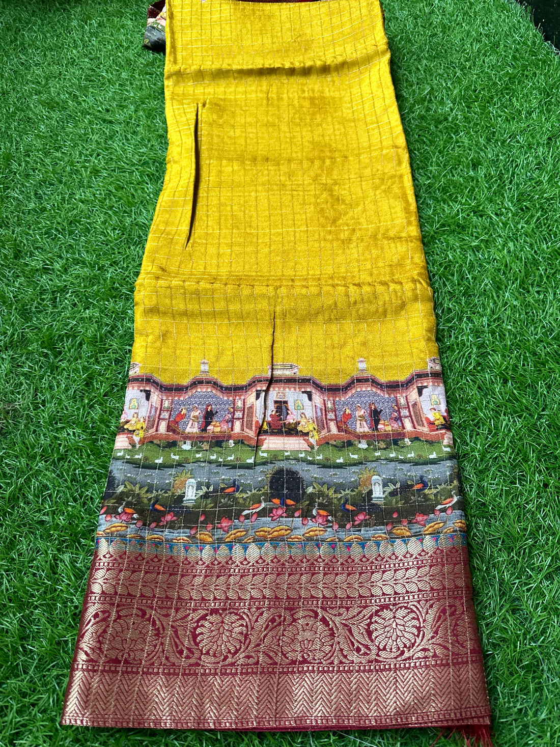 Mustard with maroon dola crepe with kalamkari border.