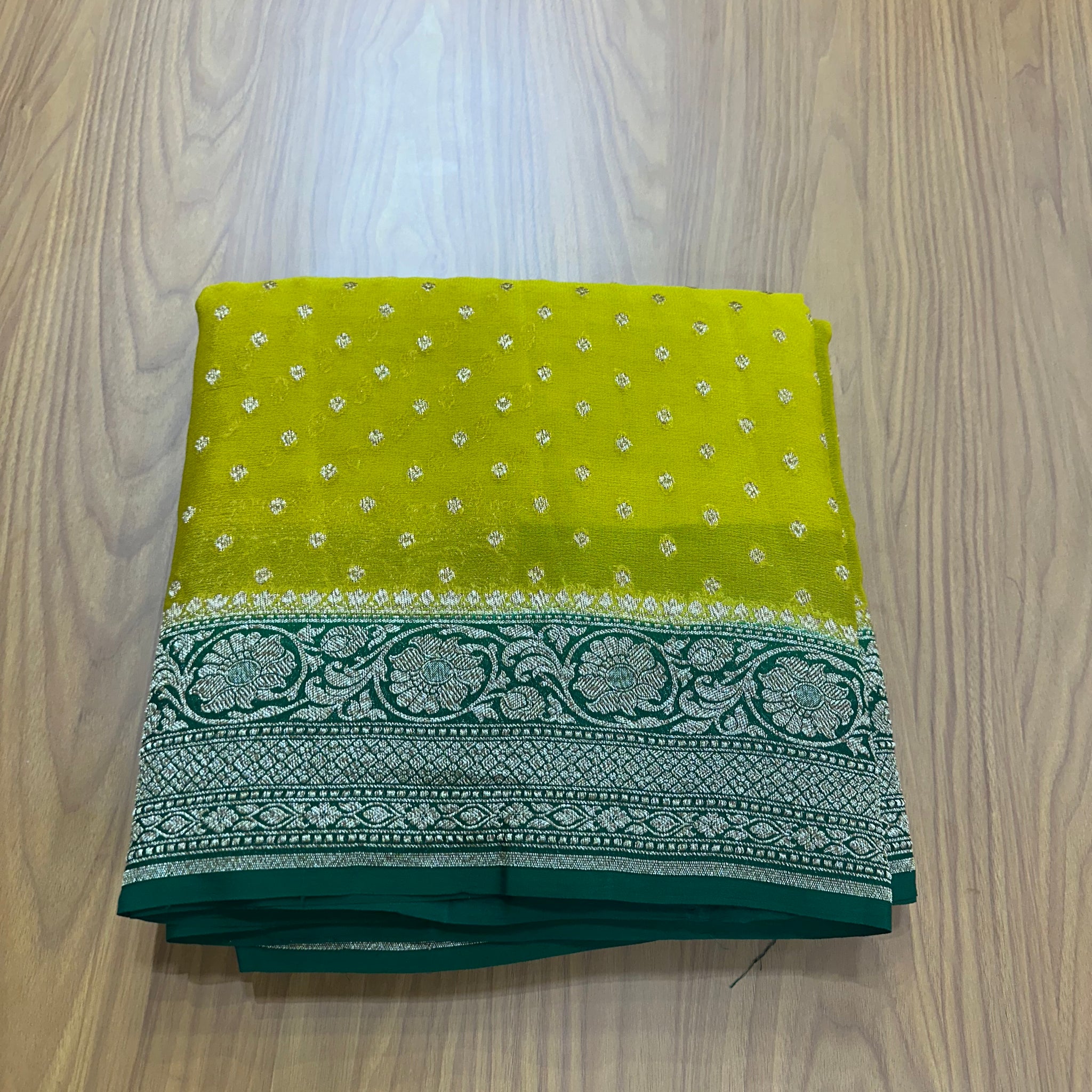 Neon green and bottle green pure khaddi Georgette sarees