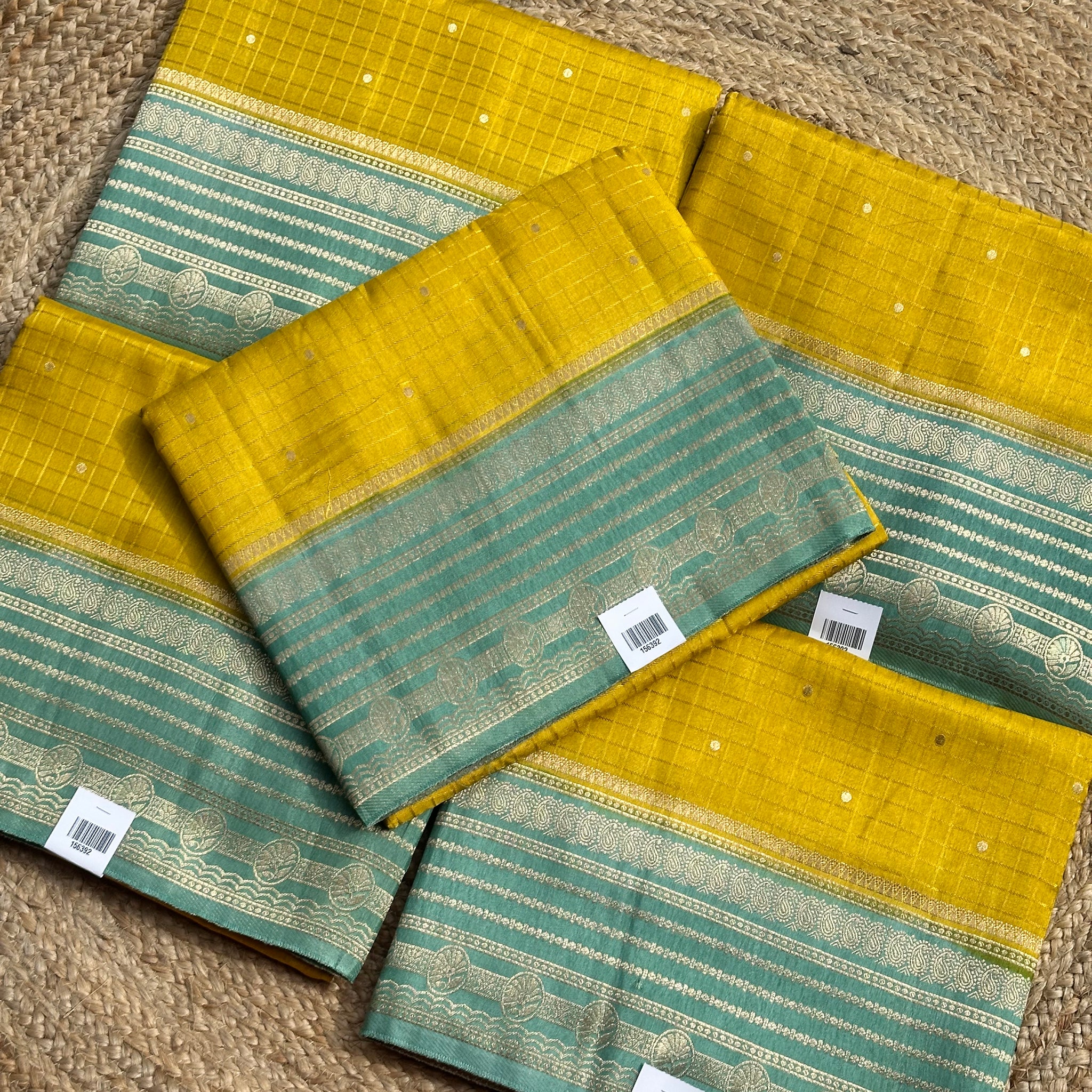 Yellow and sea green dola silk sarees