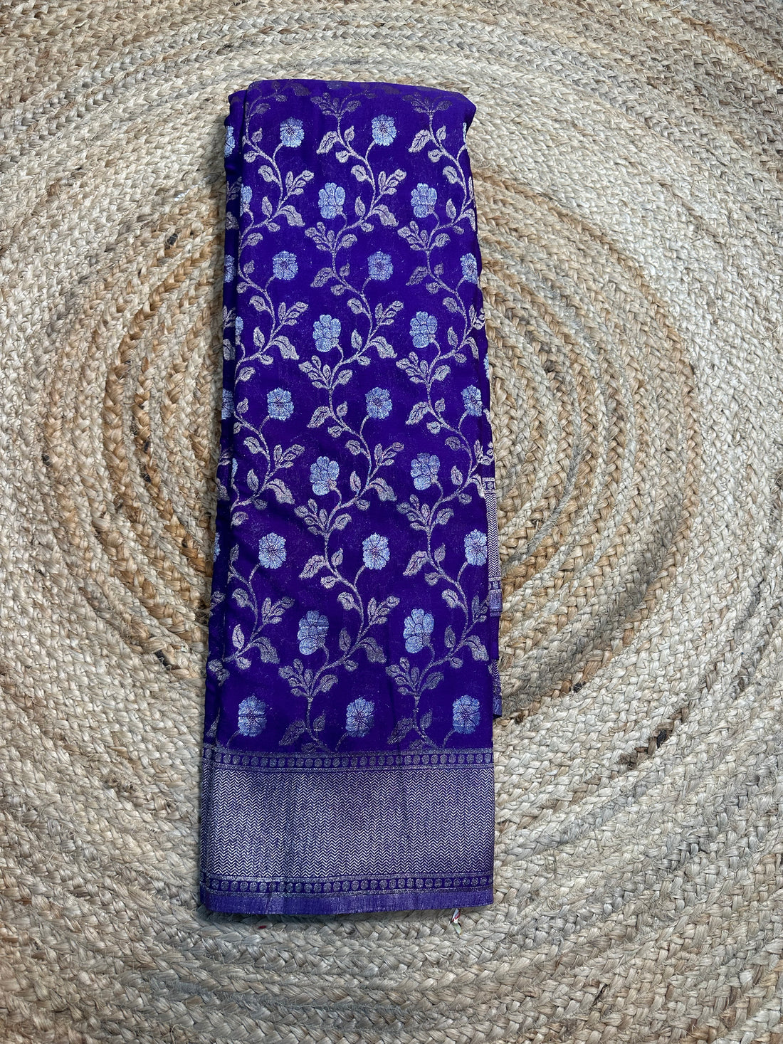 Purple designer georgette in jaal pattern saree.