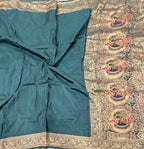 Dark Rama green Kanchi border plain modal silk saree