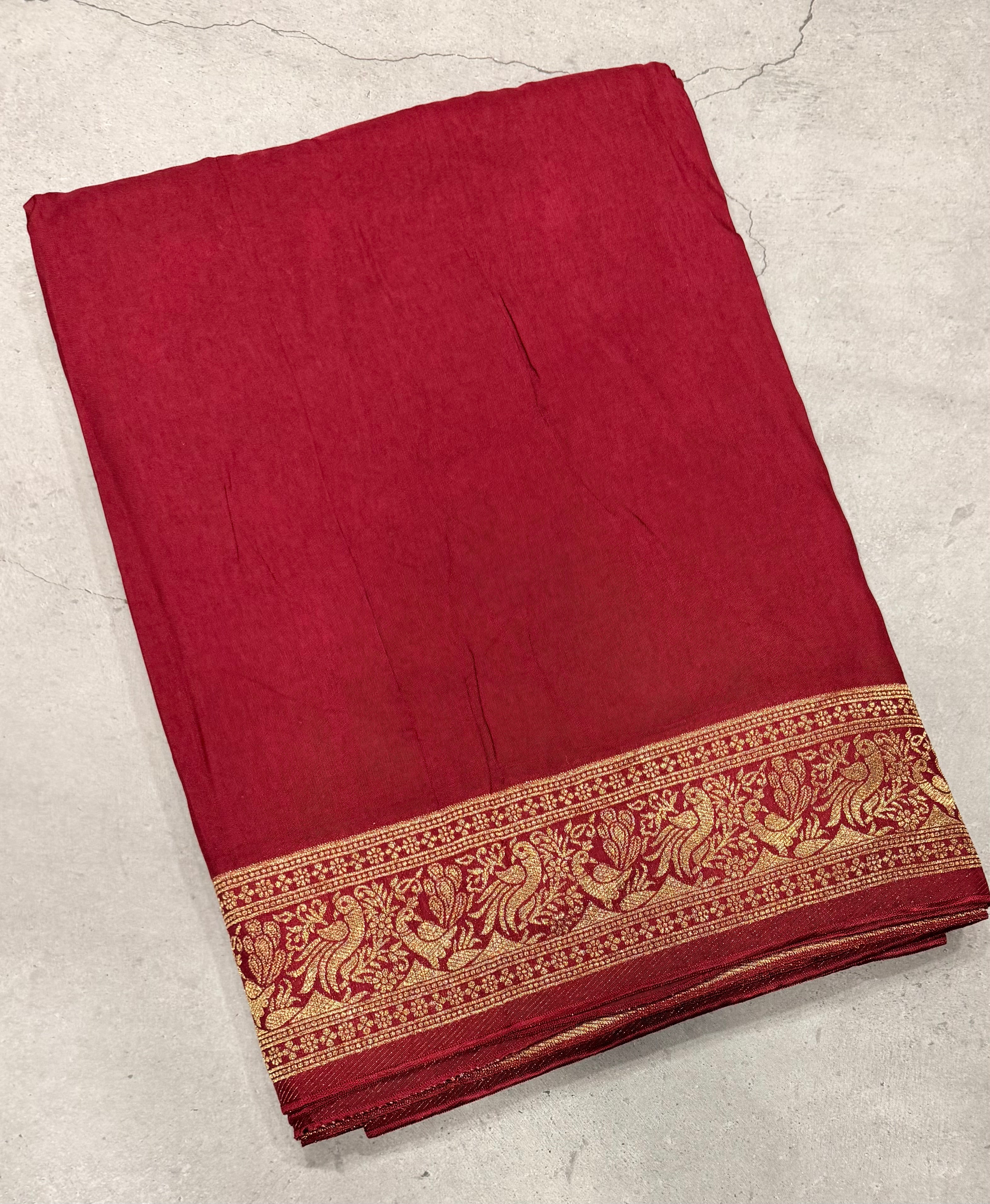 Maroon Kanchi border plain modal silk saree