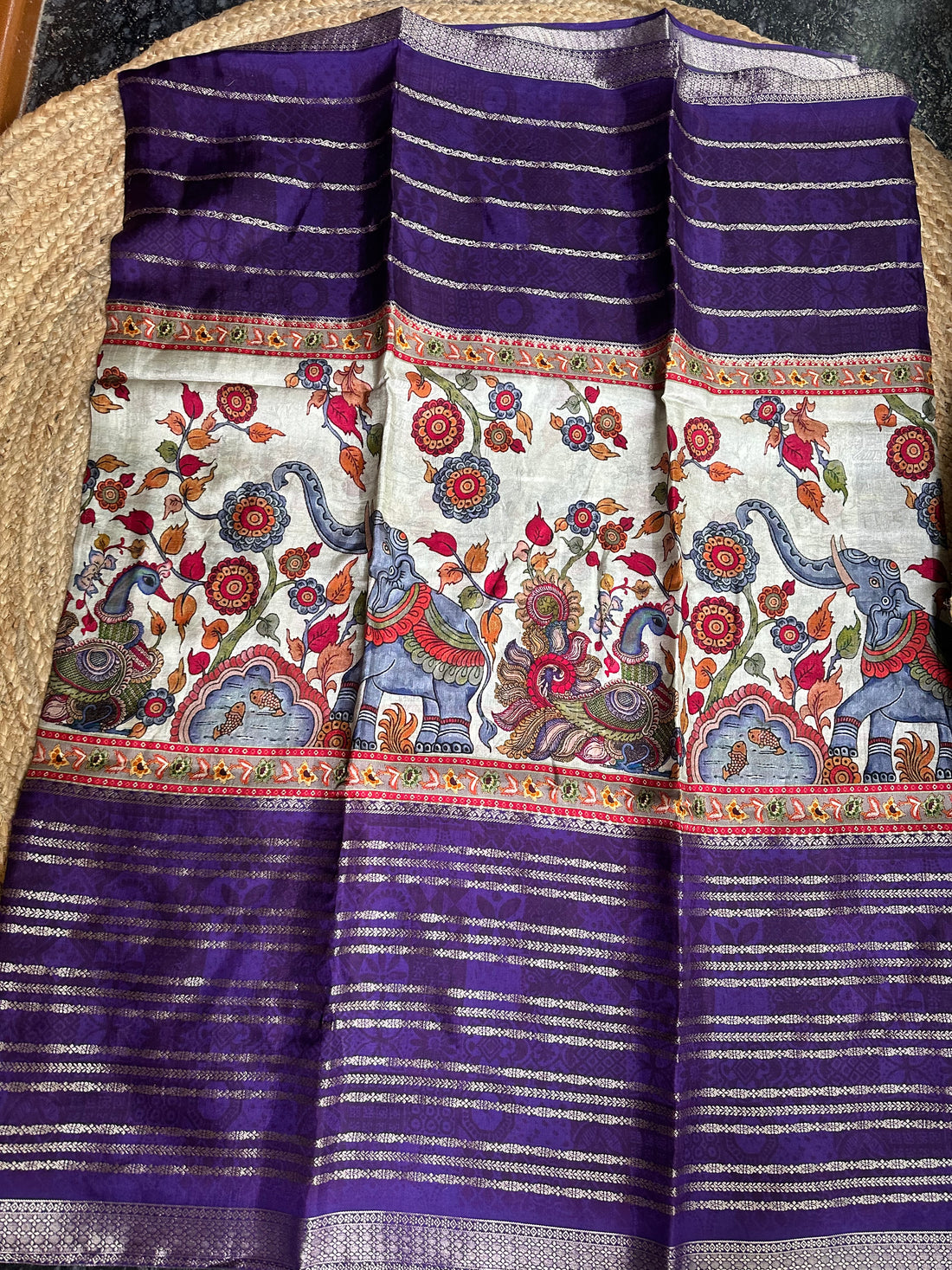 Purple and white central digital kalamkari sarees.