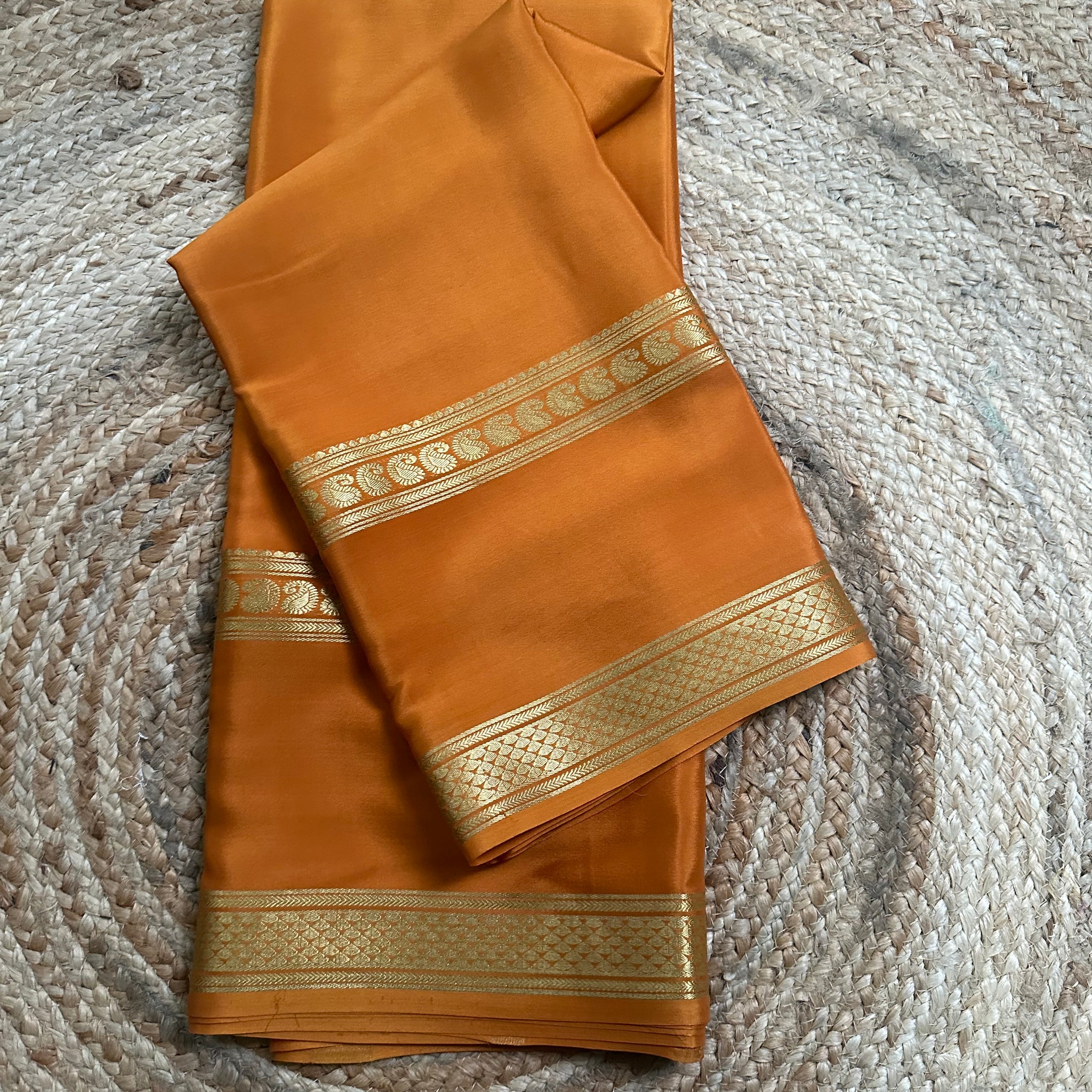 Golden mustard self bentex border pure crepe Mysore Silk sarees.