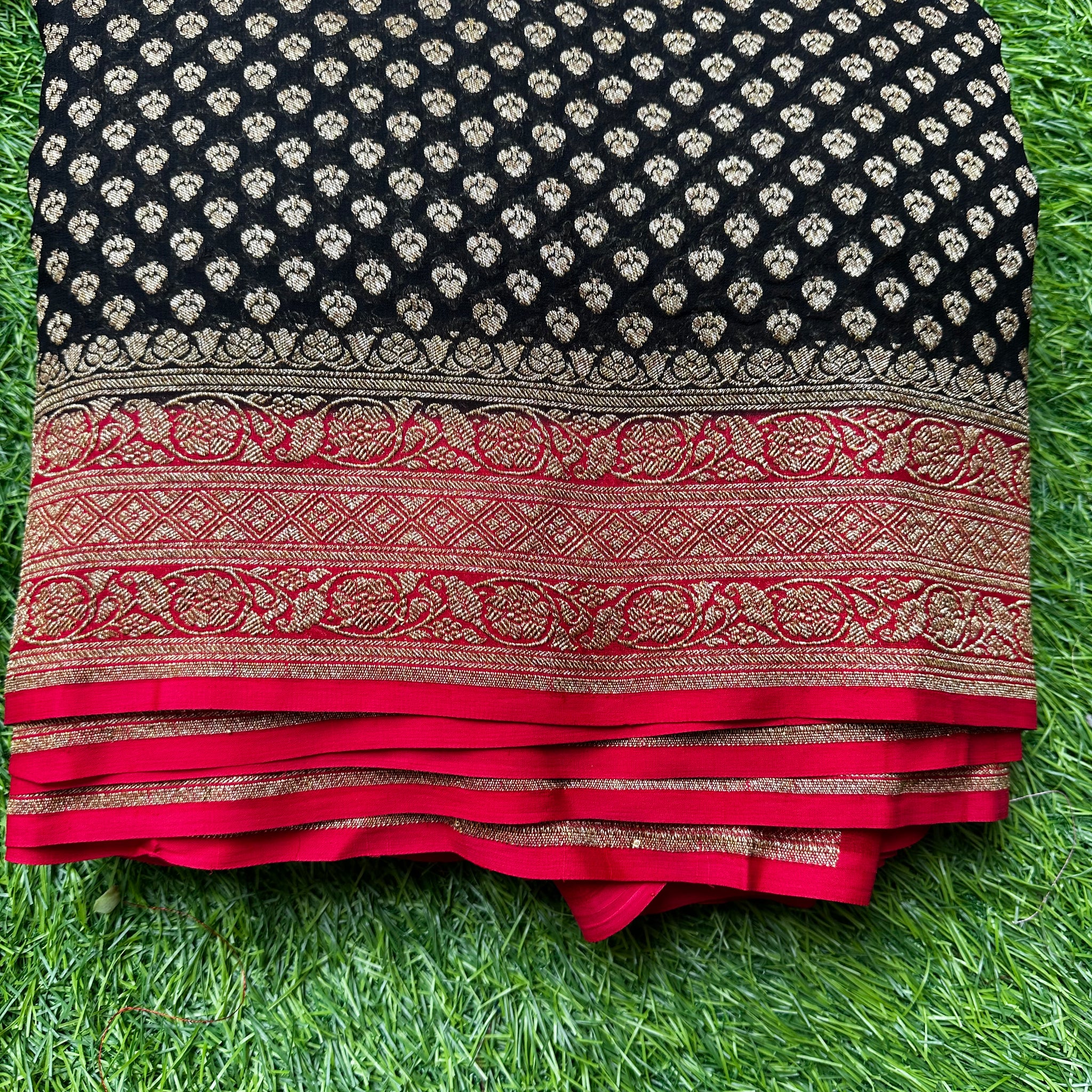 Pure khaddi georgette, black with red combo.