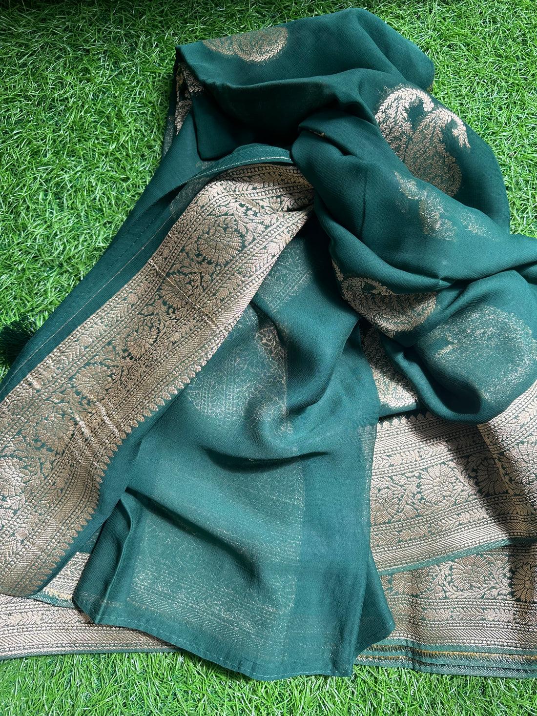 Bottle green pure viscose georgette.