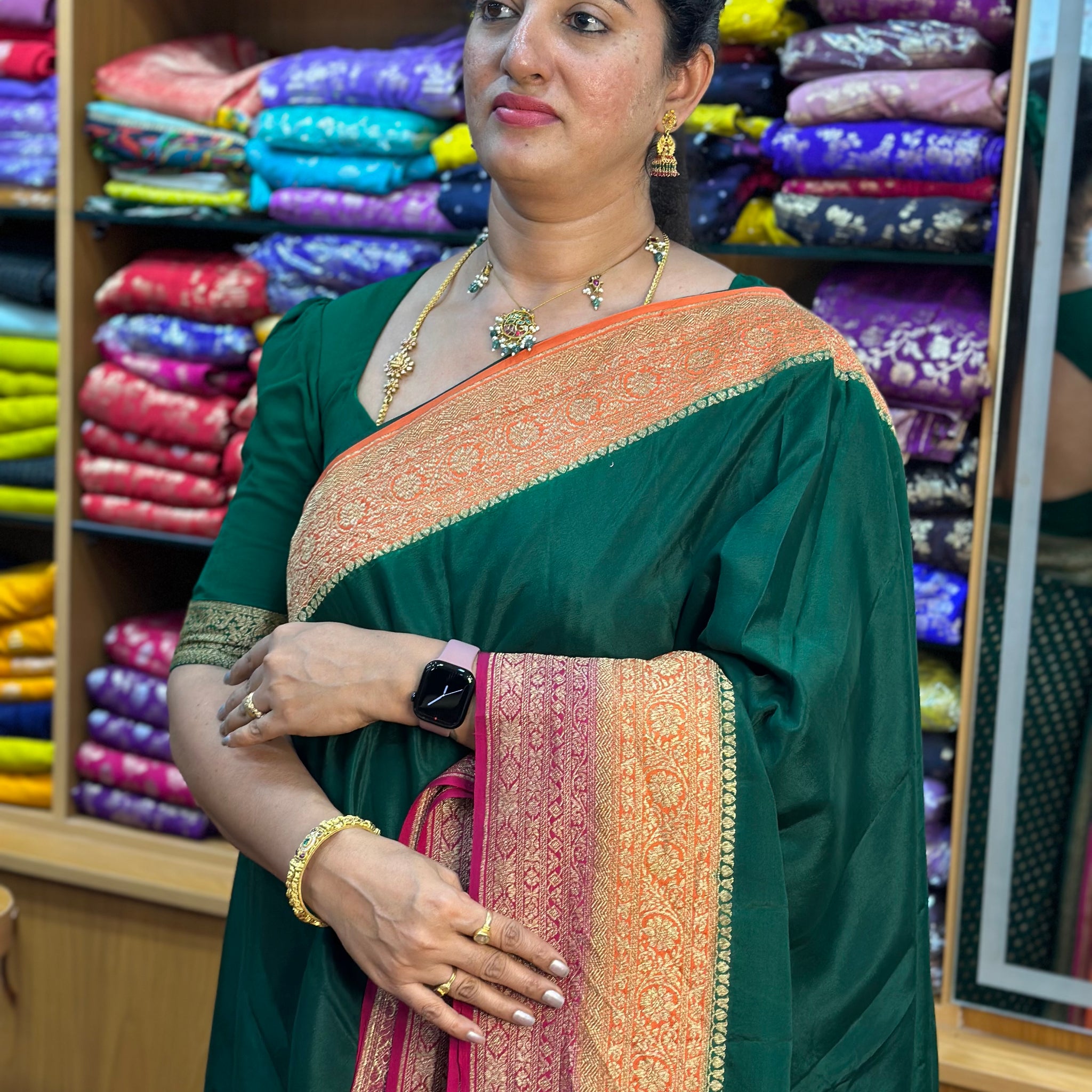 Green and pink orange pure crepe Banaras silk sarees.