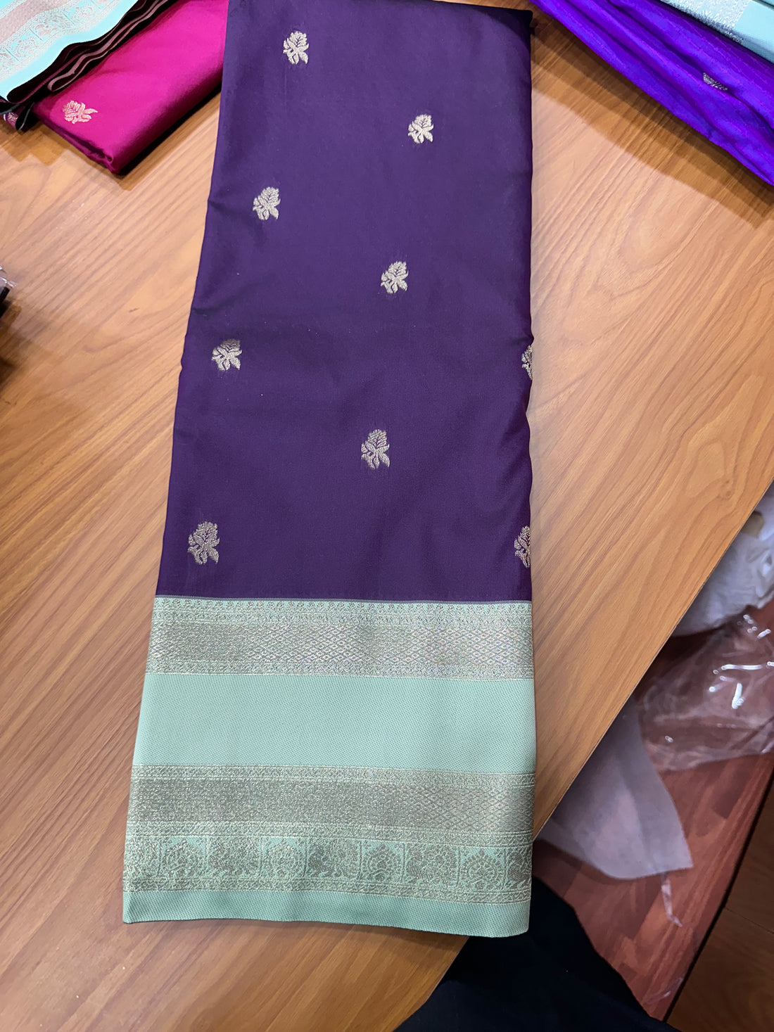 Brown and sea blue semi Kanchi sarees.