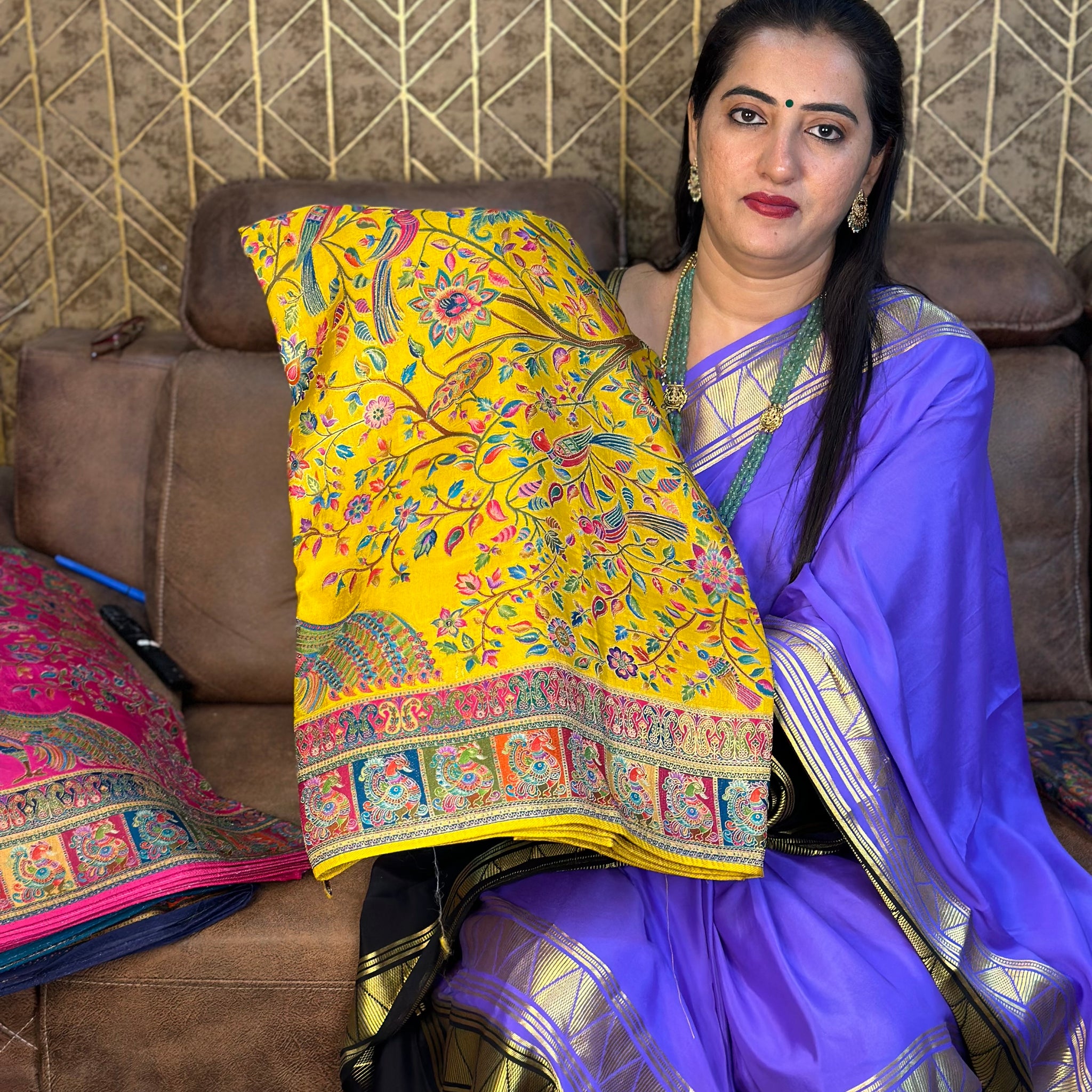 Mustard pure moonga crepe Kashmiri work all over the body.