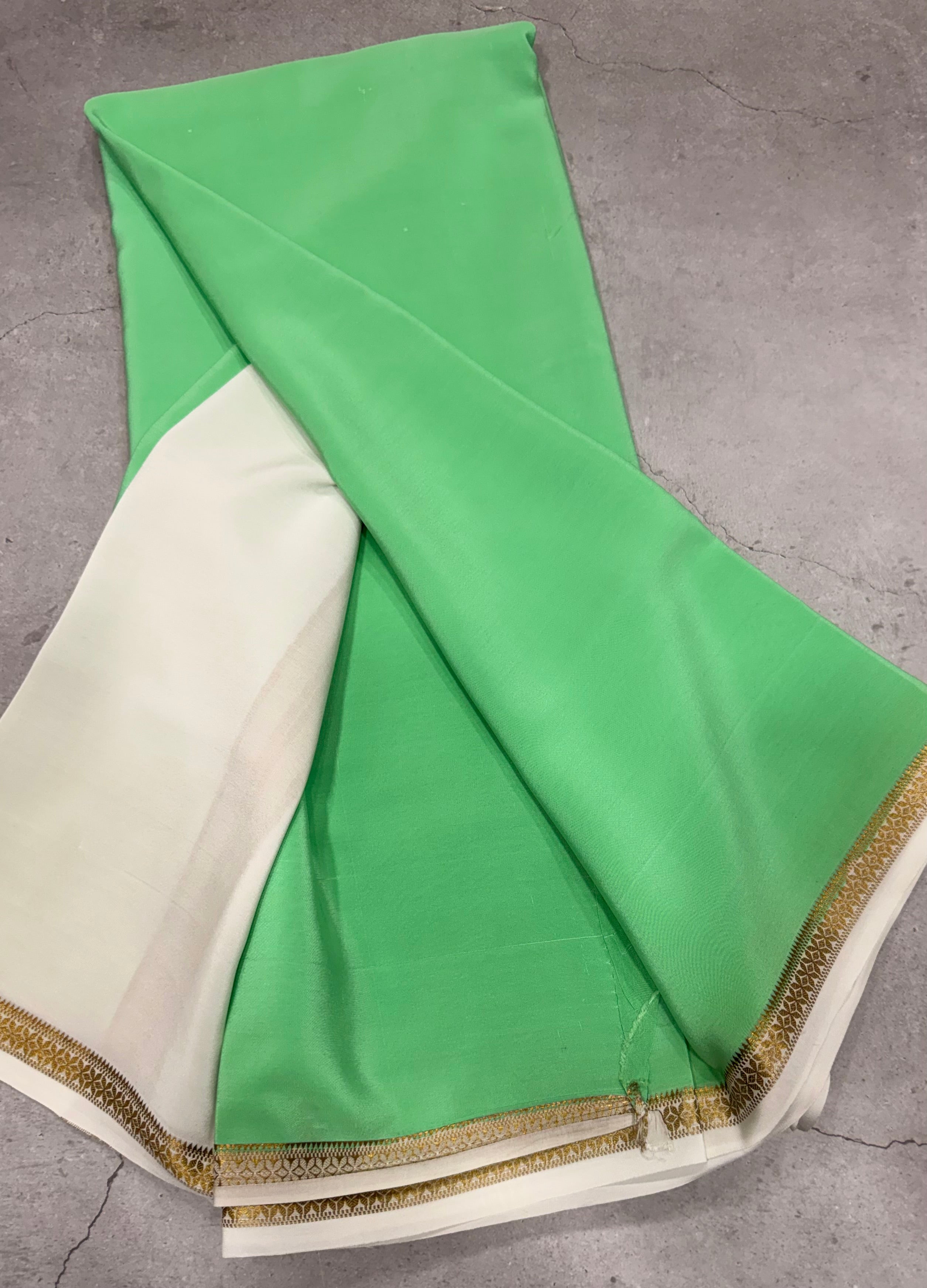 Pastel green one inch border pure Mysore silk crepe saree