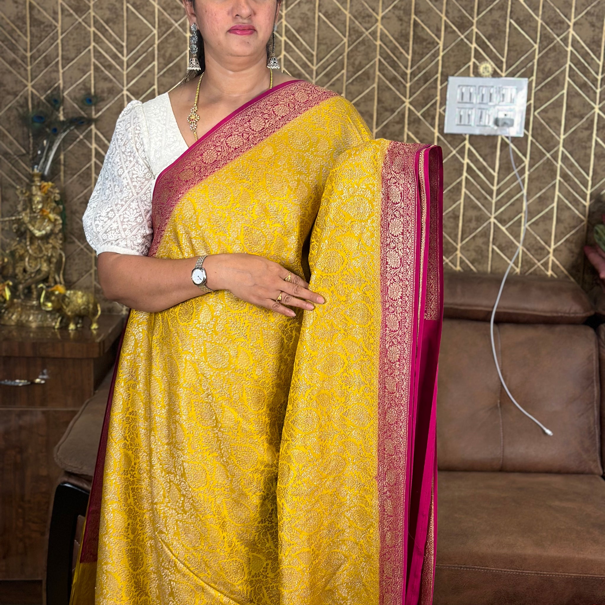 Yellow and pink brocade pure crepe Banaras silk sarees.