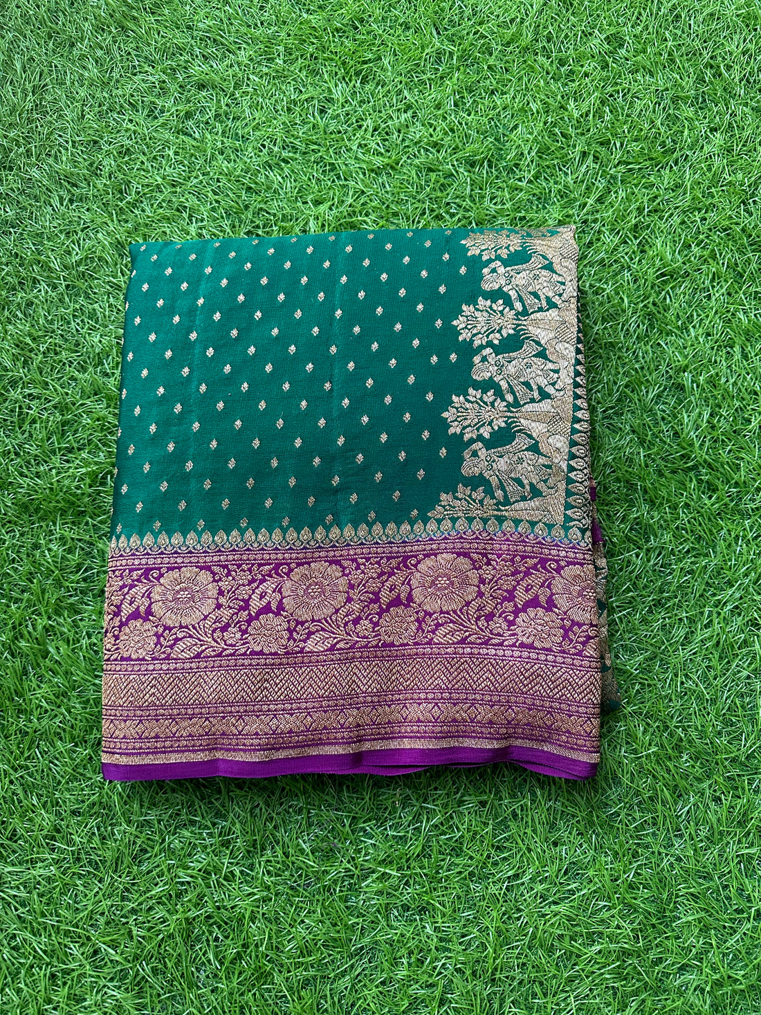 Peocock green with mejentha pure crepe Banaras handloom silk.