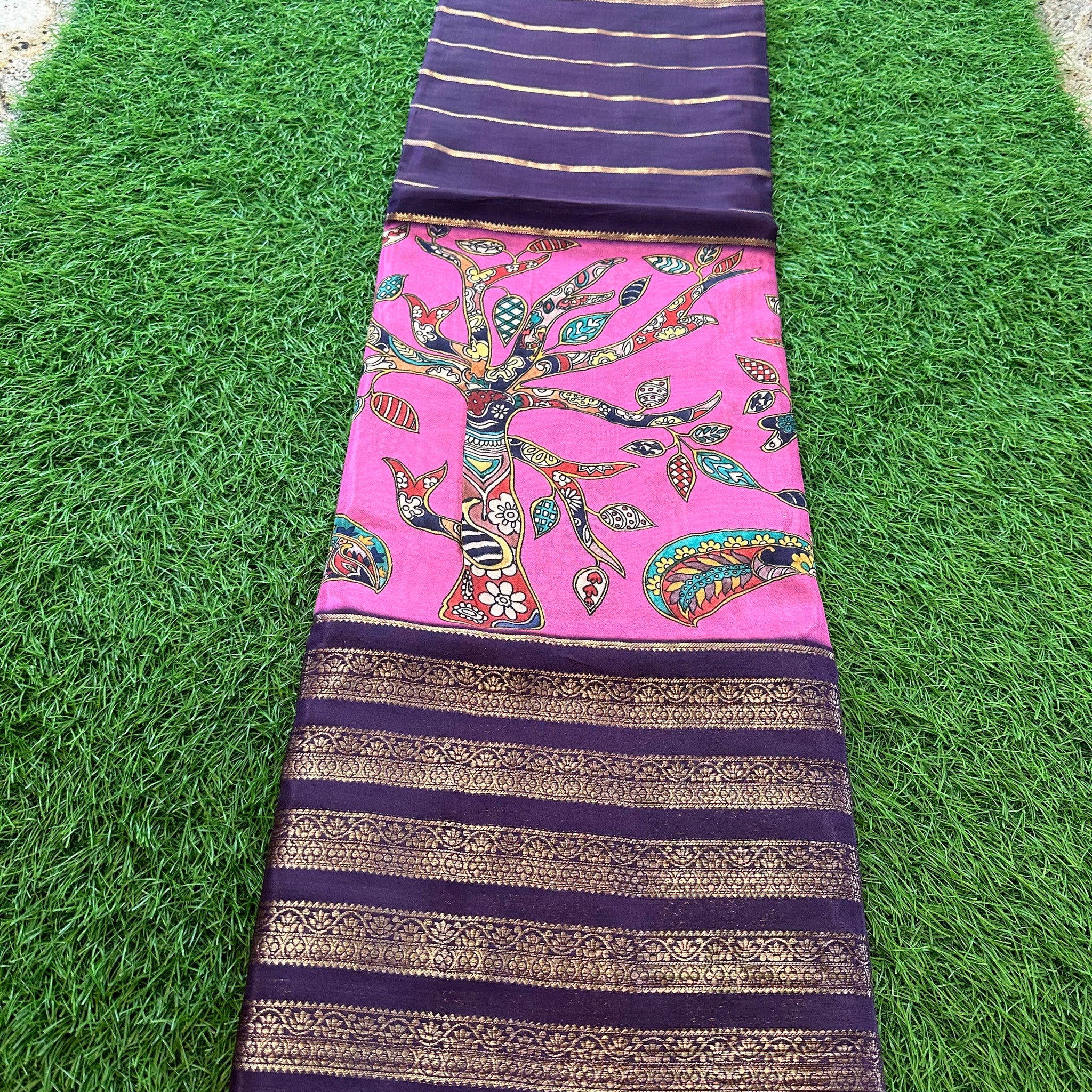 Purple with baby pink semi crepe kalamkari saree.