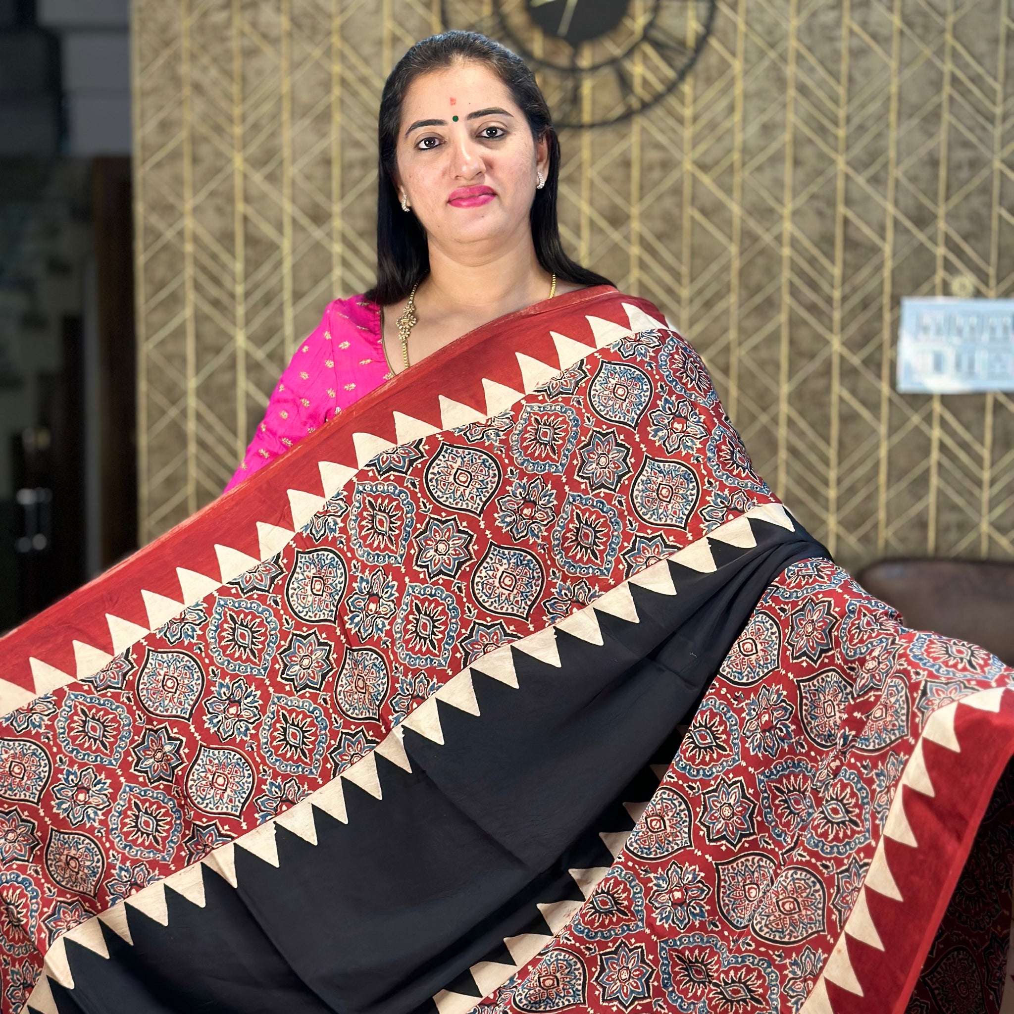 Red Ajrak prints with black pure modal silk saree.