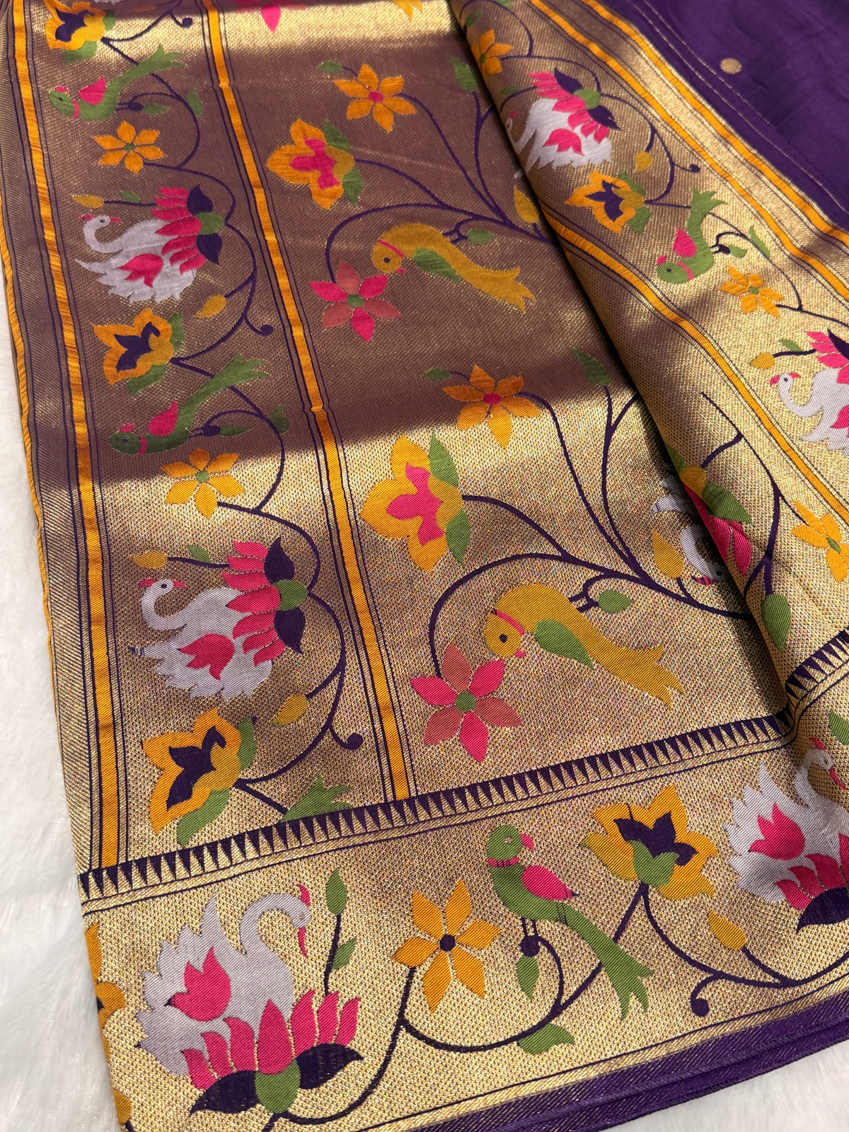 Purple pure paithani swan & peacock border saree