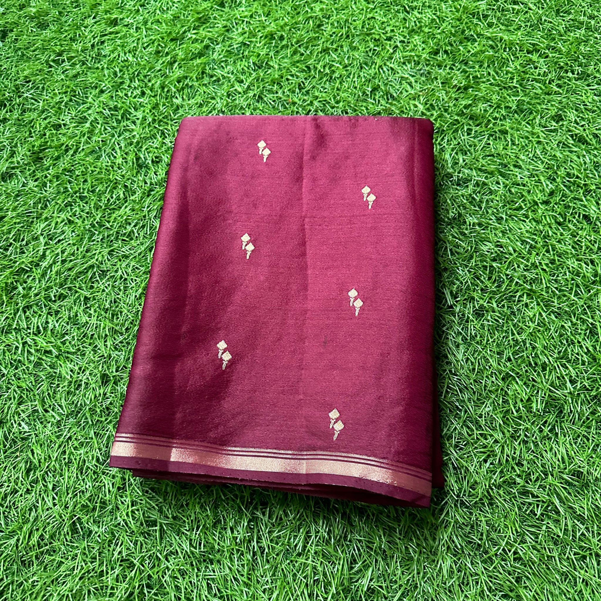 Maroon semi silk.