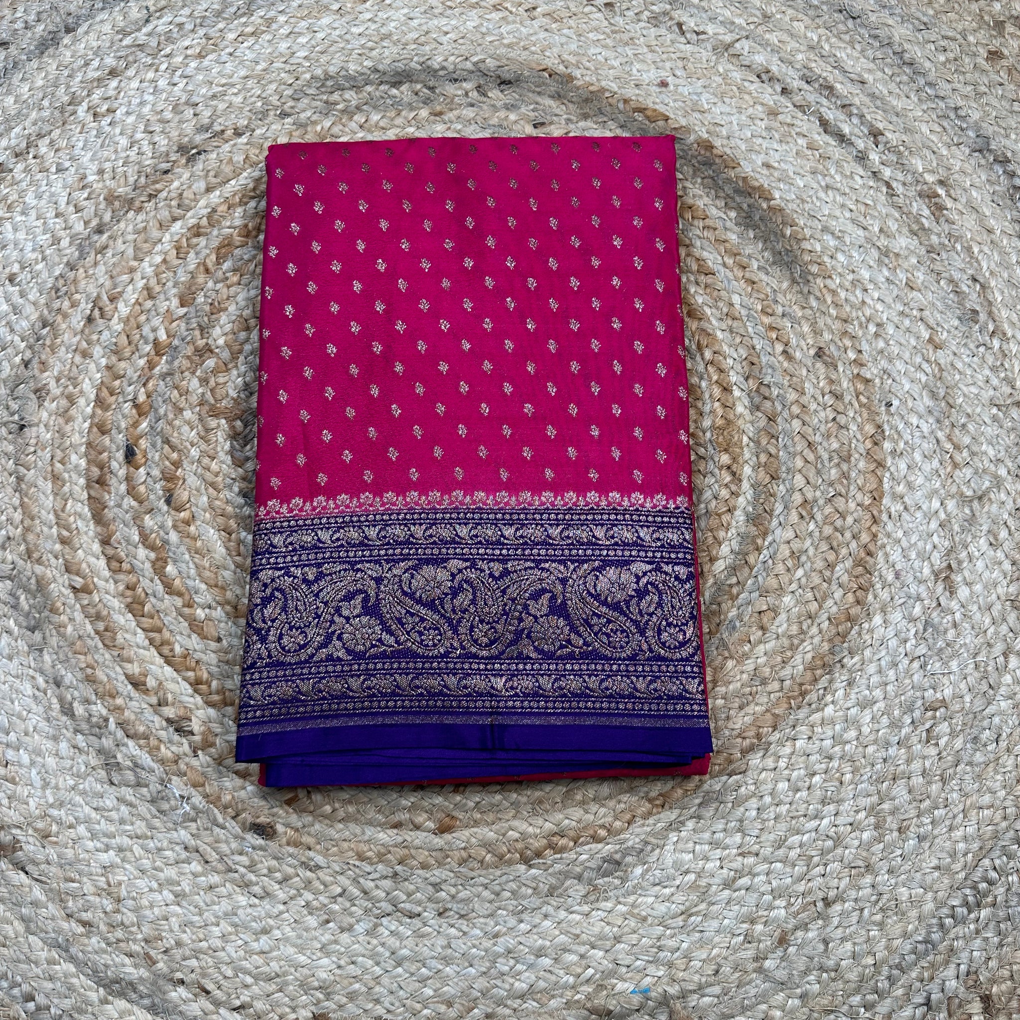 Pink and purple crepe chiffon saree with brocade blouse.