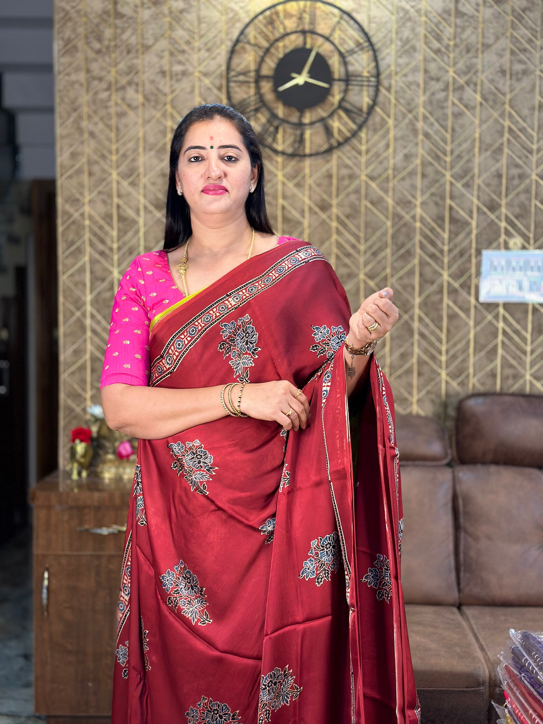 Brick red pure modal silk saree.