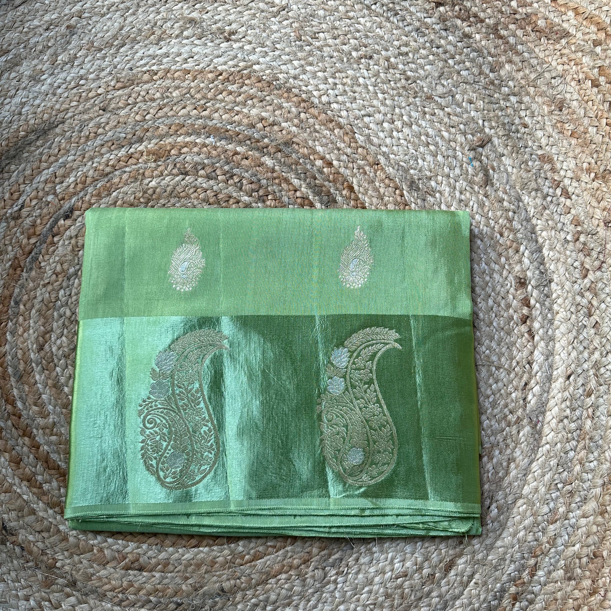 Light green dola silk with mango satin border.