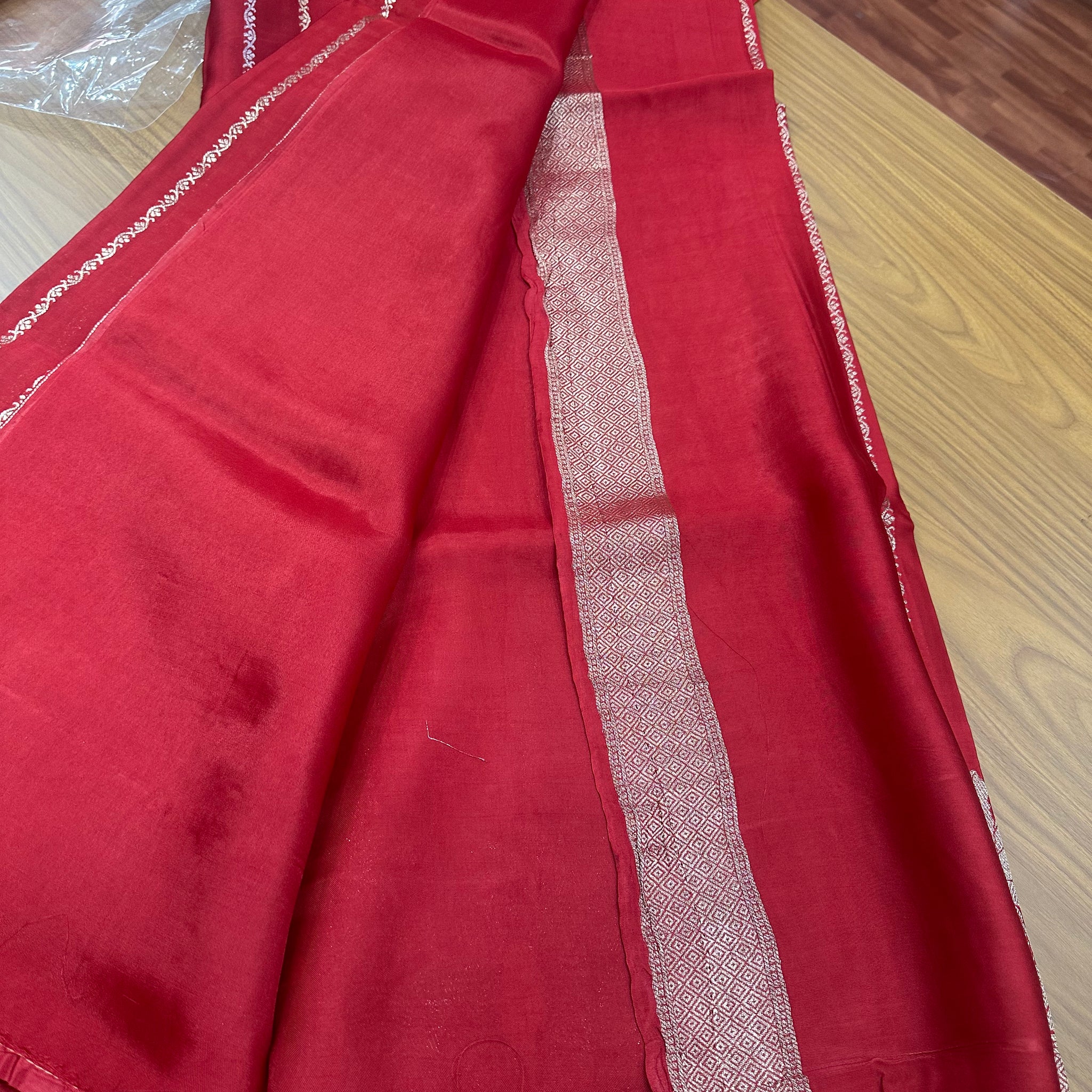 Rust orange pure satin silk sarees.