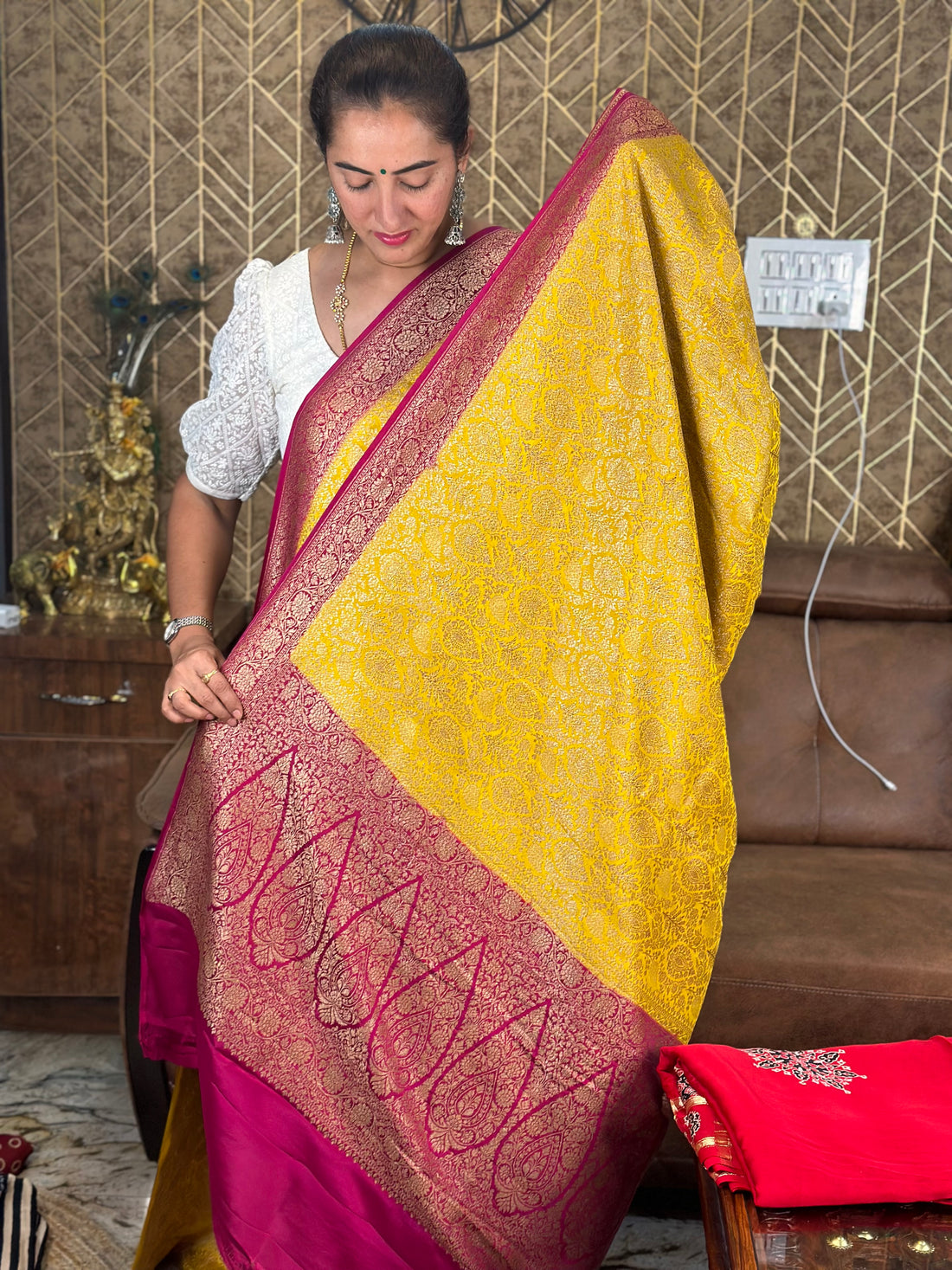 Yellow and pink brocade pure crepe Banaras silk sarees.