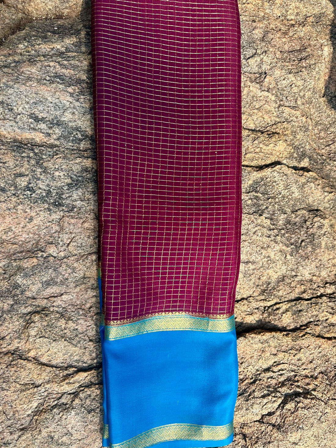 Mejentha with sky blue, Mysore Silk crepe checks with bentex border. 70 grams thickness.