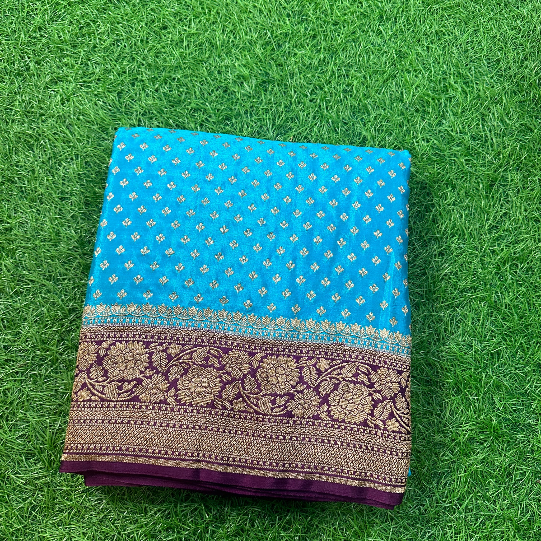 Sky blue and chocolate brown pure crepe Banaras silk.