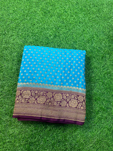 Sky blue and chocolate brown pure crepe Banaras silk.