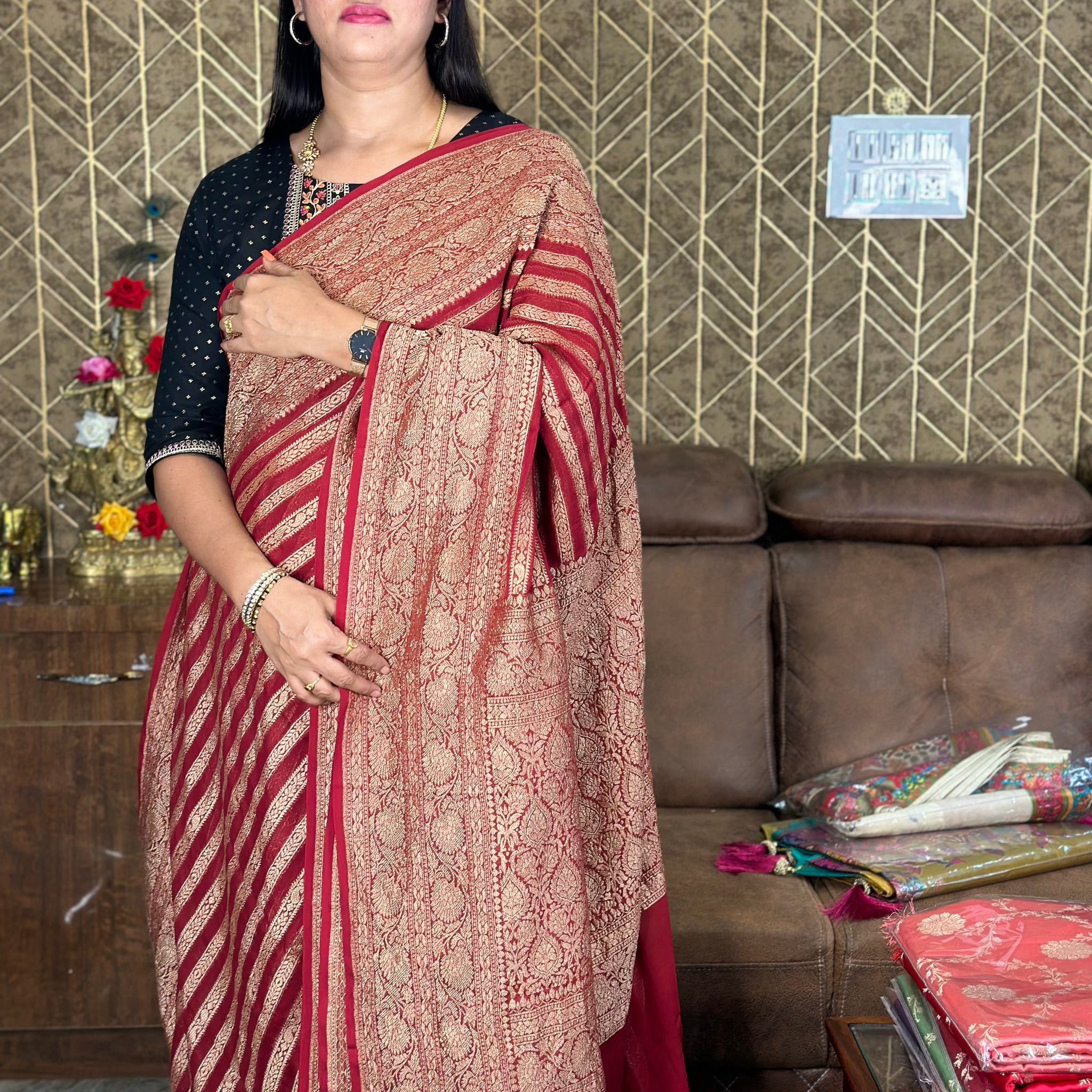 Maroon Pure khaddi Georgette saree with horizontal stripes.