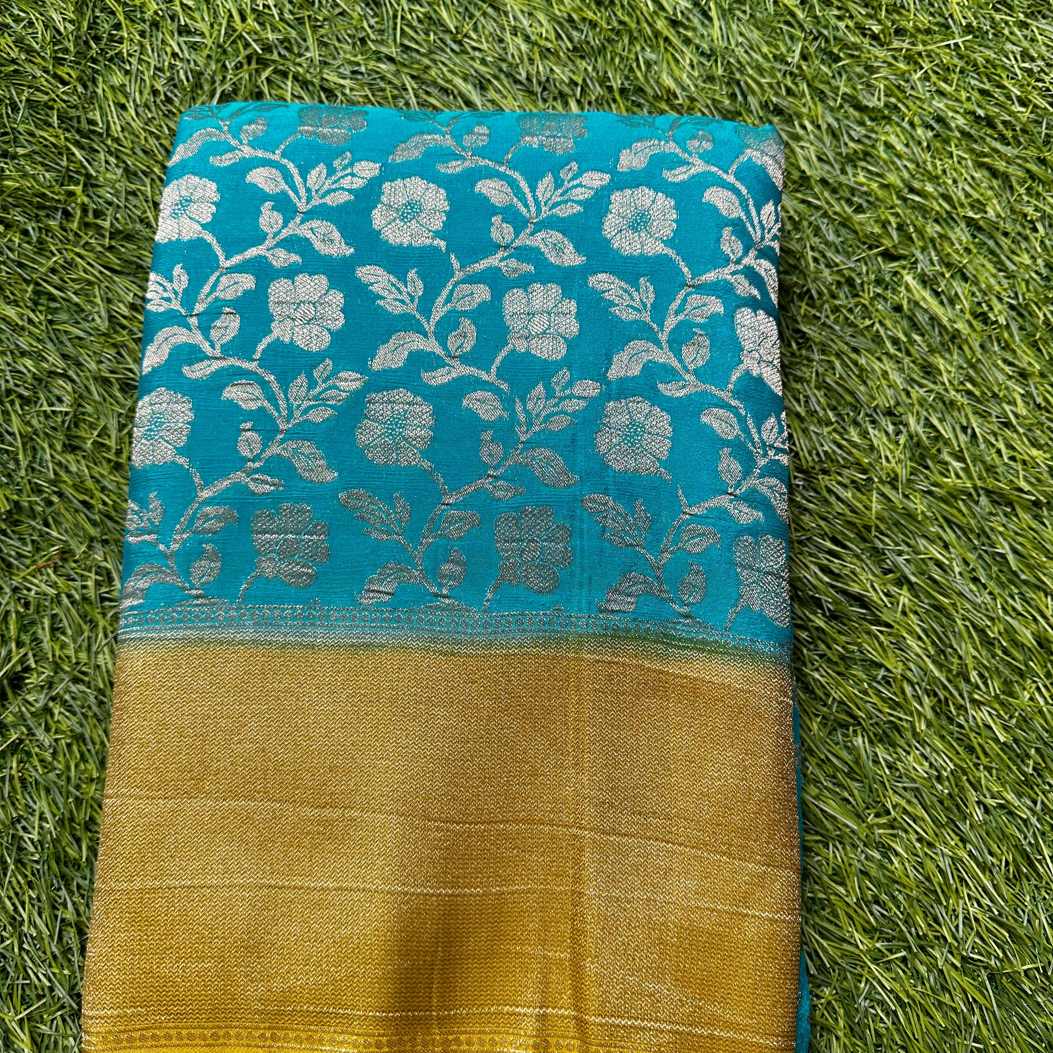 Designer georgette jaal pattern sea blue with mustard.