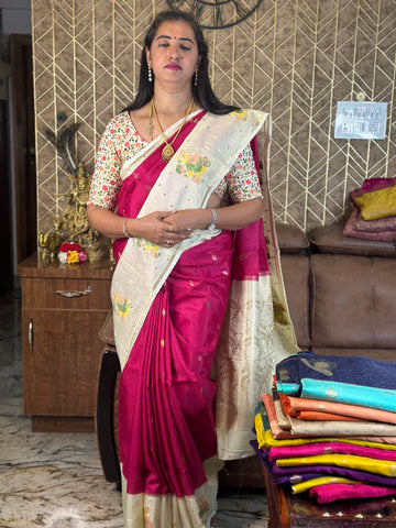 Rani pink and white dola silk saree.