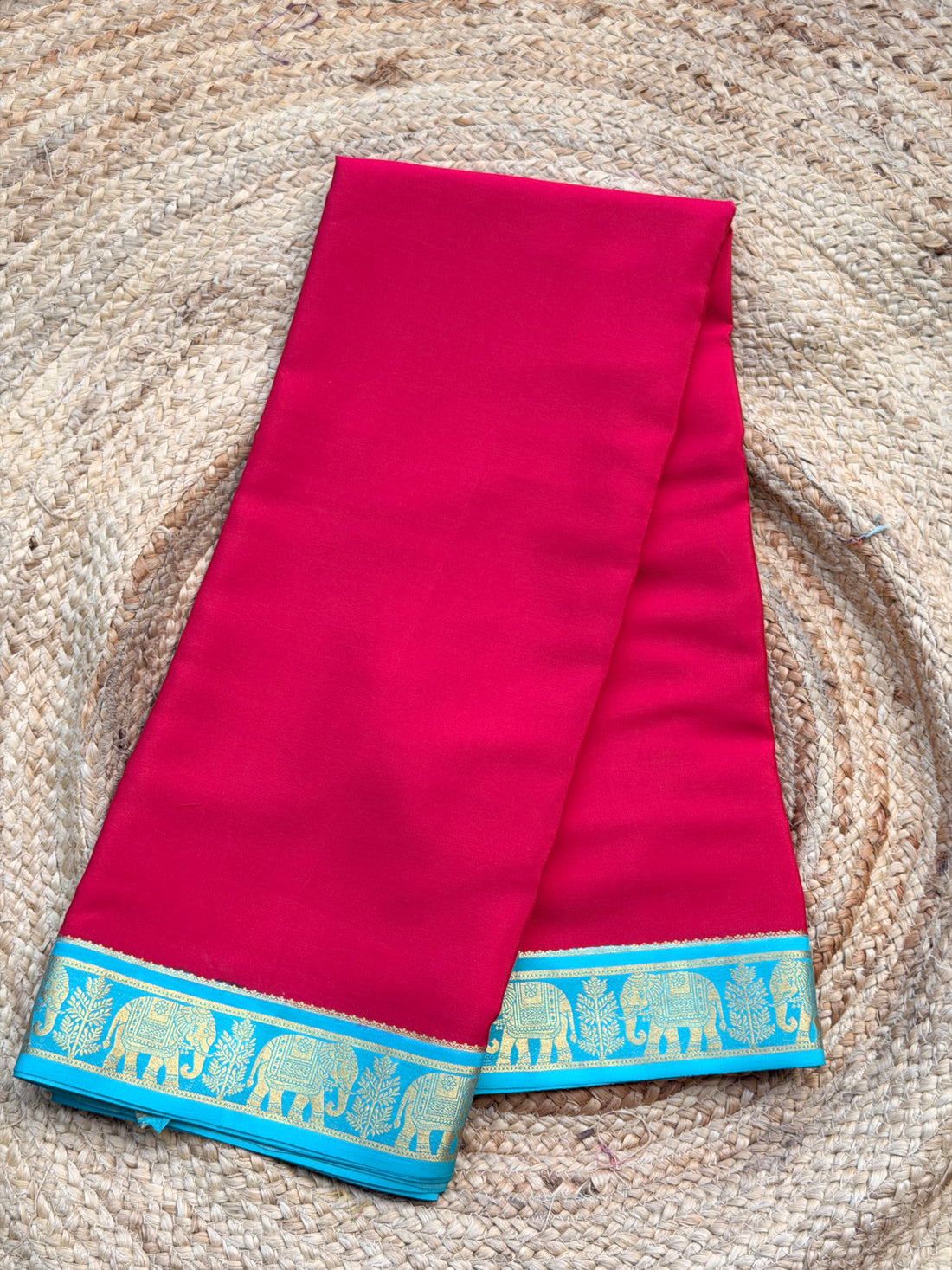 Pink and sky blue elephant border crepe Mysore silk 120 gsm