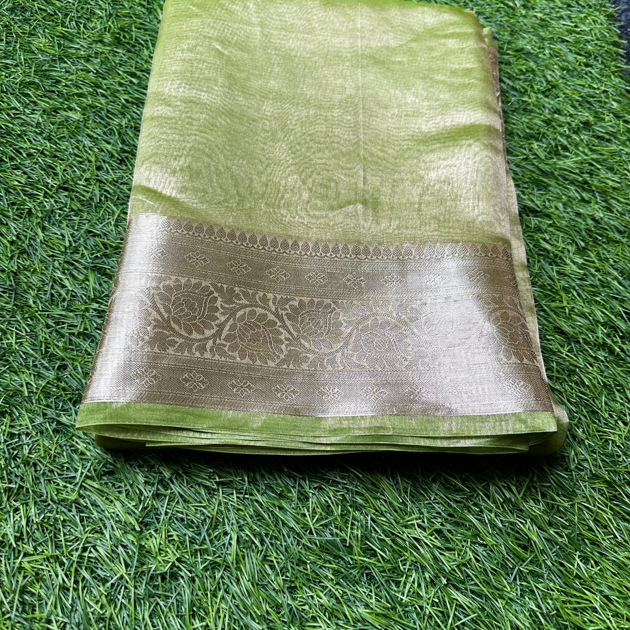 Pure Banarasi tissue silk.