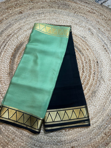 Olive green and black pure Mysore Silk crepe half and half pattern. 120 gsm