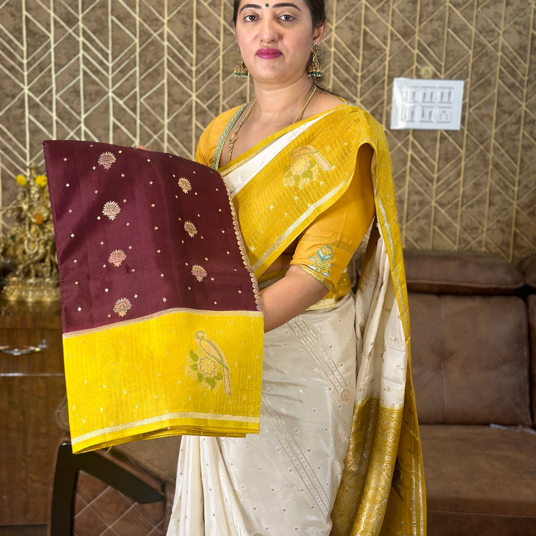 Brown and mustard dola silk with checks border.
