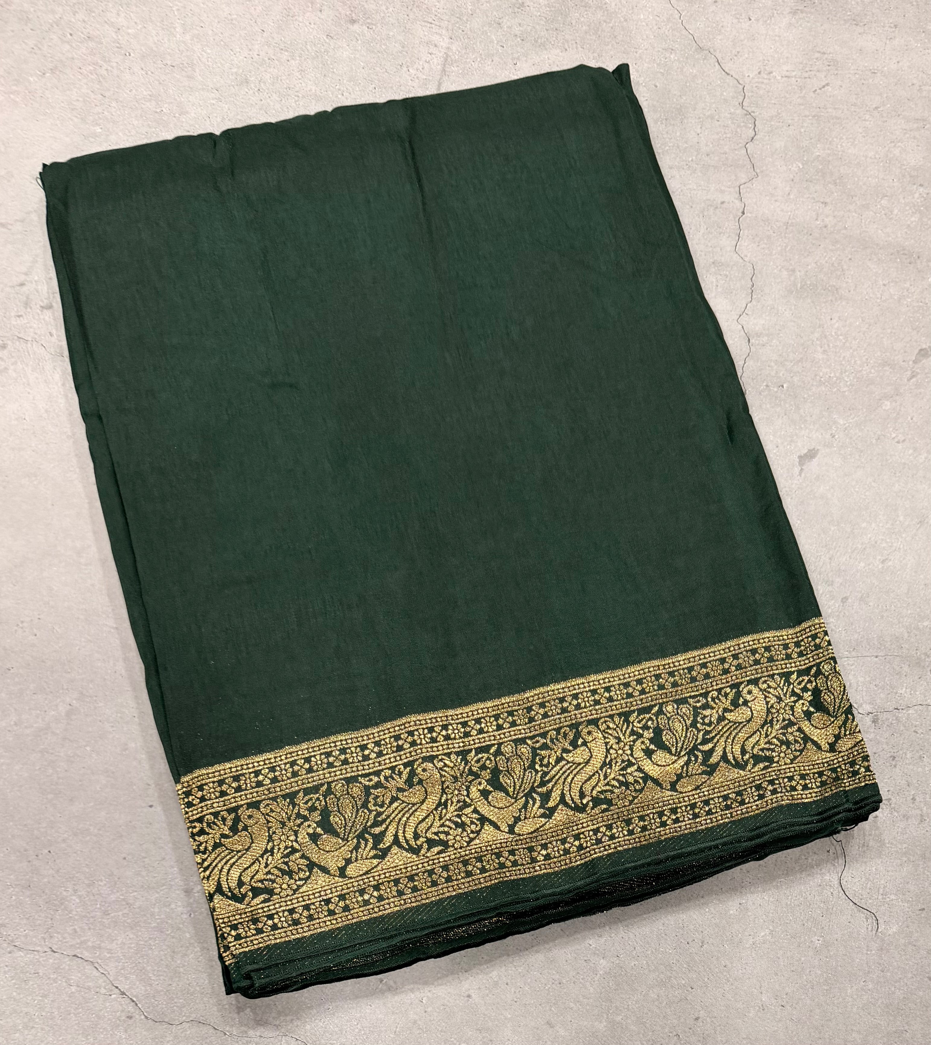 Bottle green Kanchi border plain modal silk saree