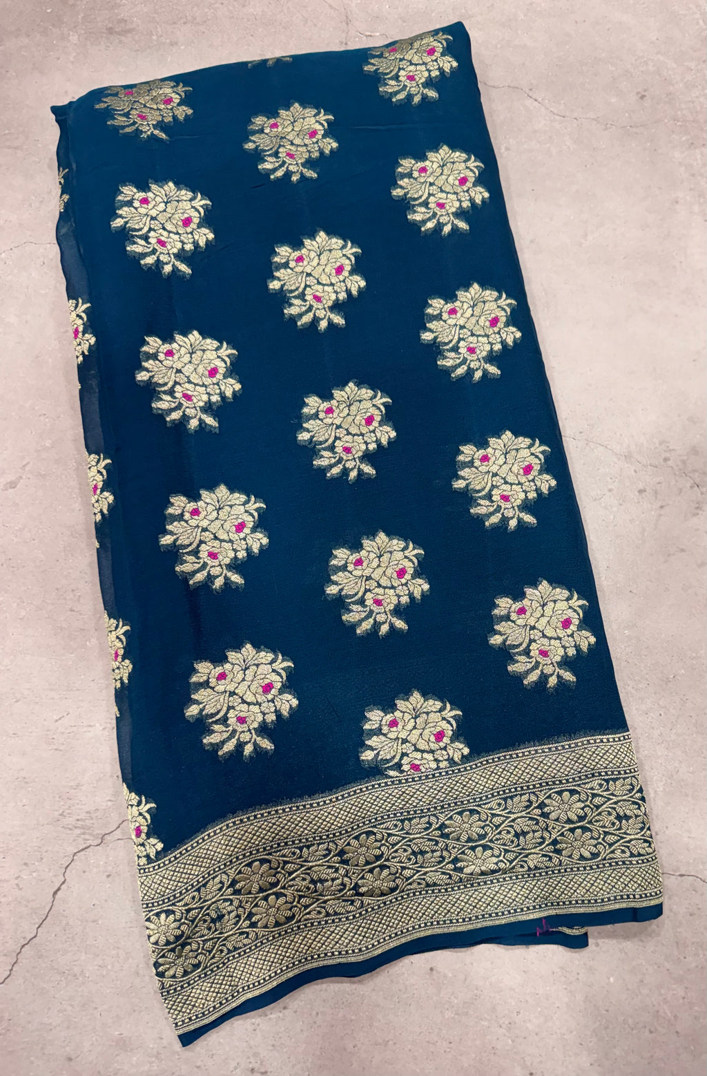 Peacock blue jaal pattern pure georgette with water zari saree