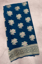 Peacock blue jaal pattern pure georgette with water zari saree