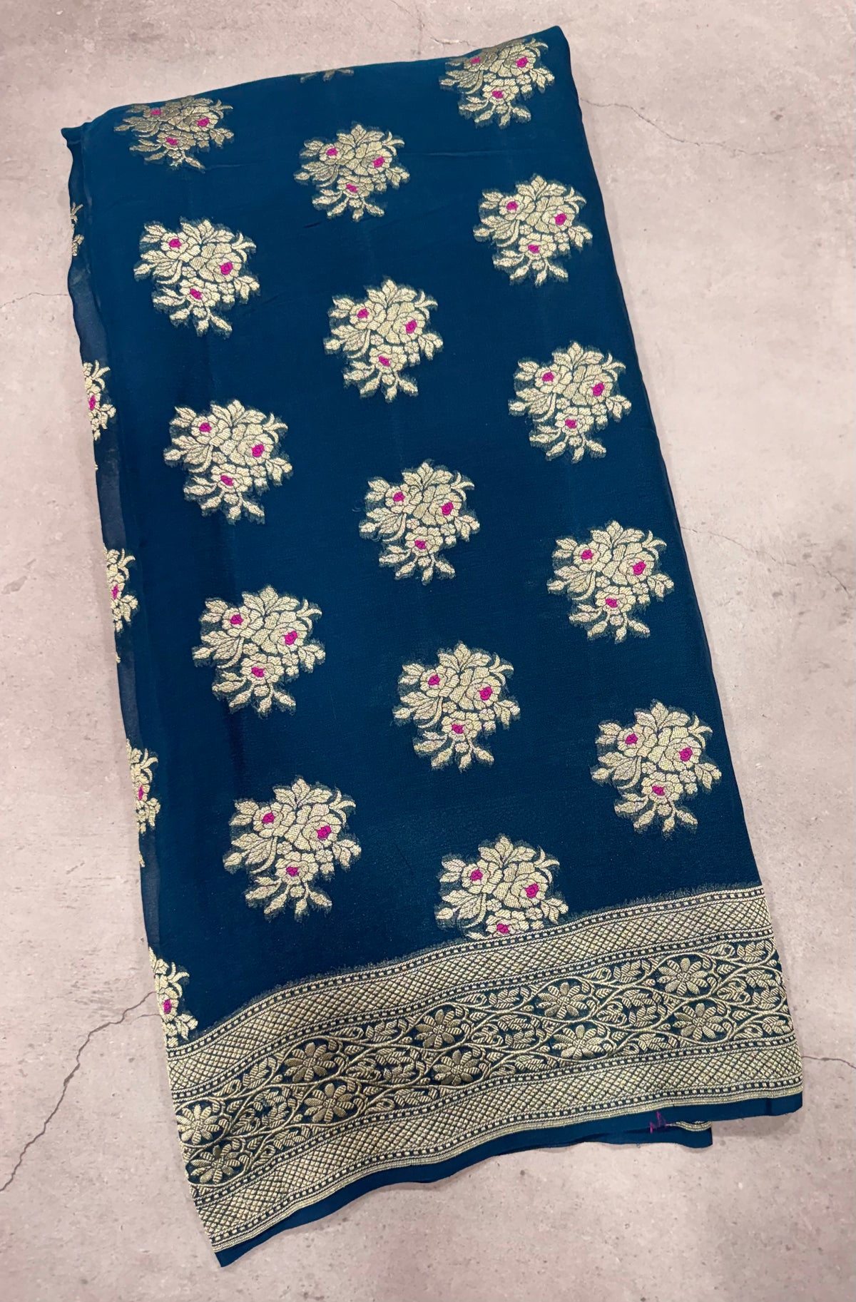 Peacock blue jaal pattern pure georgette with water zari saree