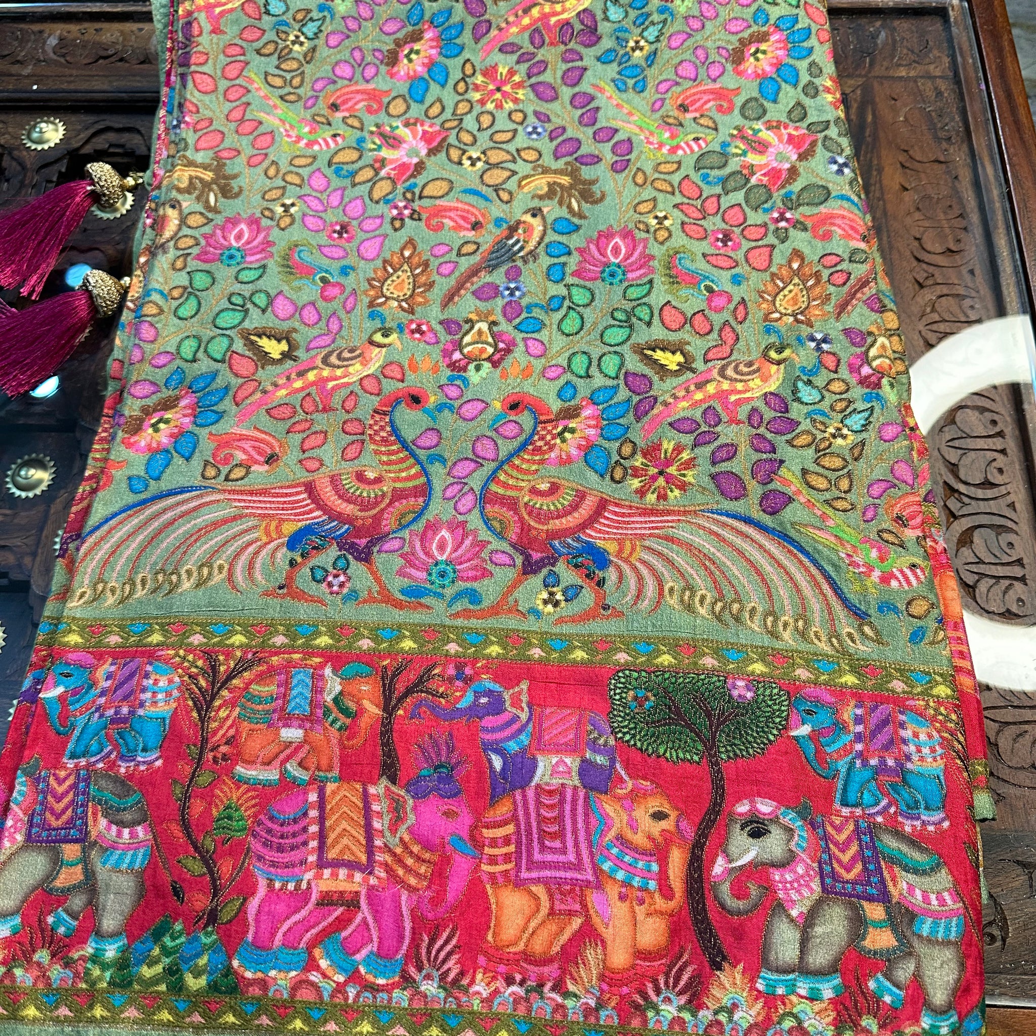 Parrot green pure moonga crepe Kashmiri work all over the body.