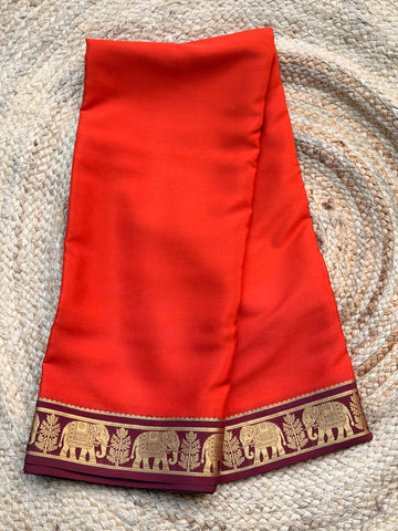 Rust orange and coffee brown elephant border Mysore silk 120gsm